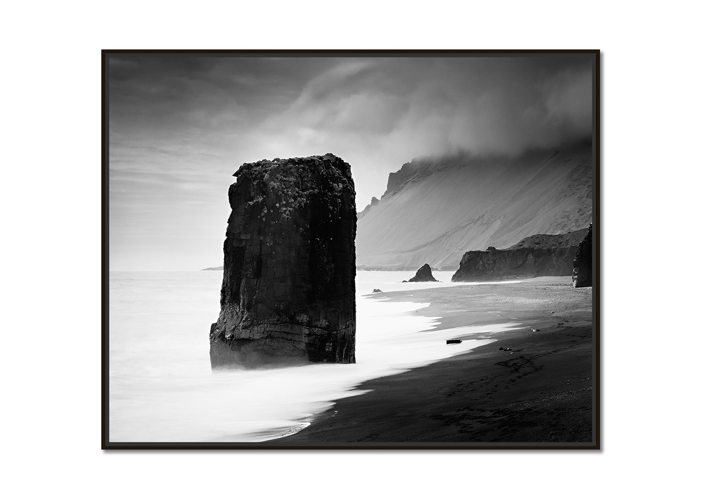 Flooded Rock, Black Beach, Iceland, black and white photography, landscape, art - Photograph by Gerald Berghammer