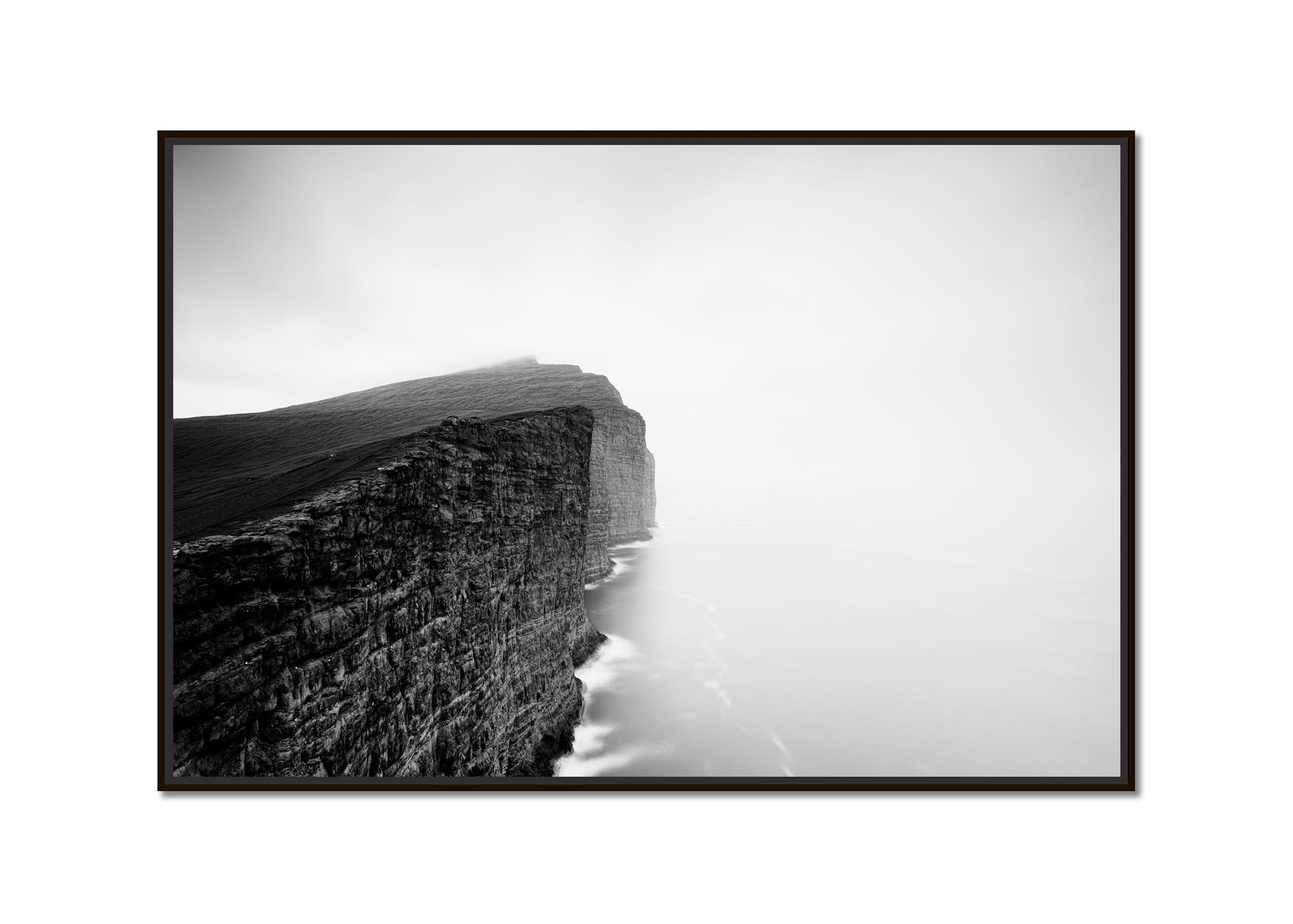 Foggy Slave Cliff, North Atlantic Ocean, Faroe Islands, landscape photography - Photograph by Gerald Berghammer