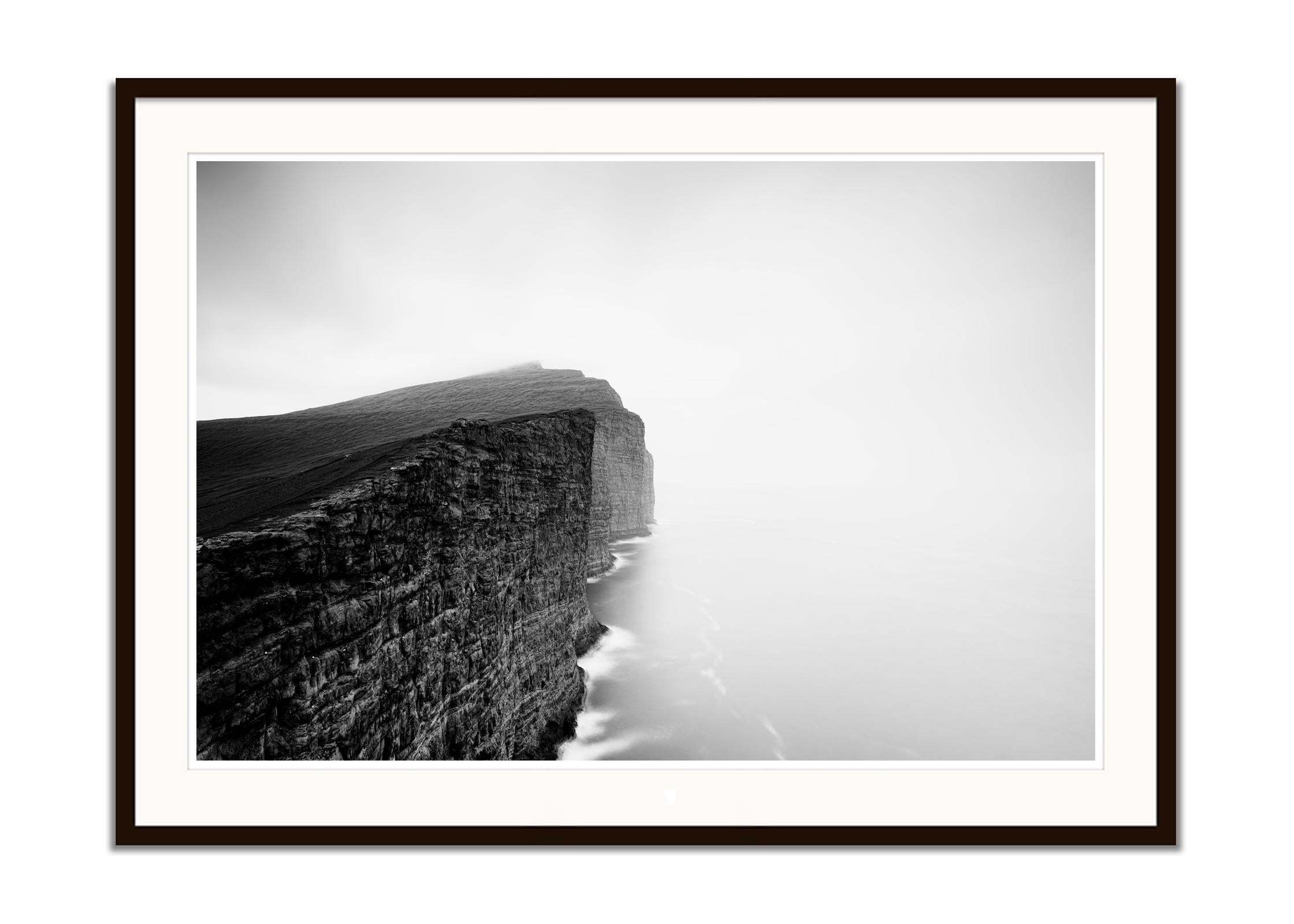 Foggy Slave Cliff, North Atlantic Ocean, Faroe Islands, landscape photography - Gray Color Photograph by Gerald Berghammer