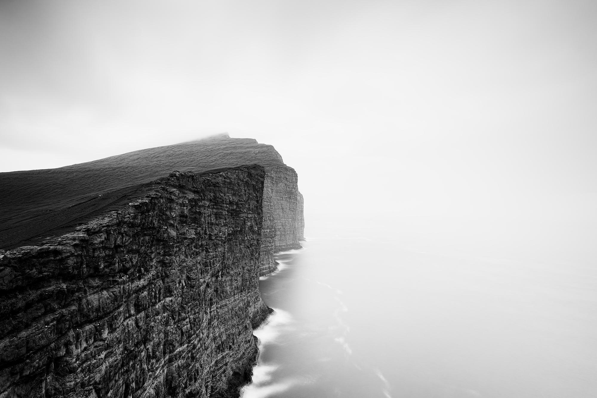 Gerald Berghammer Color Photograph - Foggy Slave Cliff, North Atlantic Ocean, Faroe Islands, landscape photography