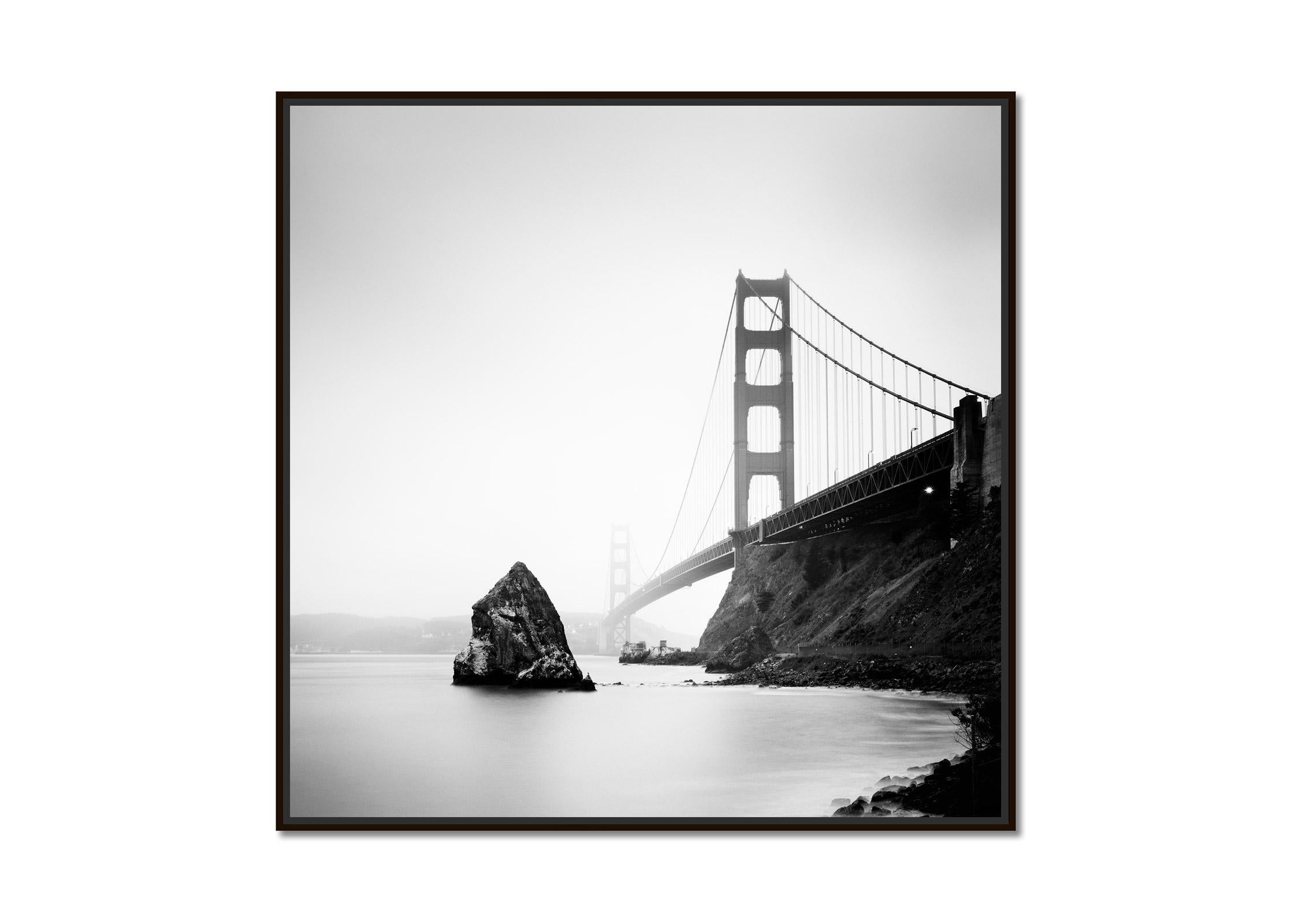 Golden Gate Bridge, fort point rock, San Francisco, b&w landscape photography - Photograph by Gerald Berghammer