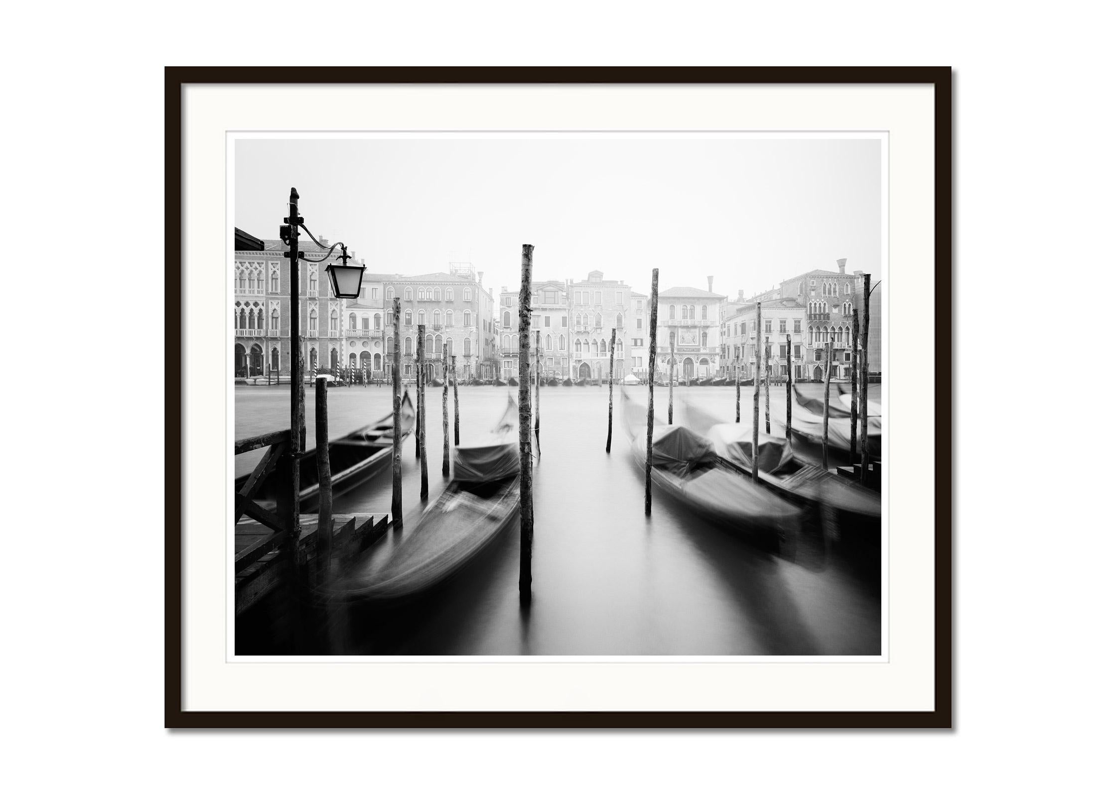 Black and white fine art long exposure cityscape - landscape photography. Gondola on the Canal Grande at sunrise Venice, Italy. Archival pigment ink print, edition of 7. Signed, titled, dated and numbered by artist. Certificate of authenticity