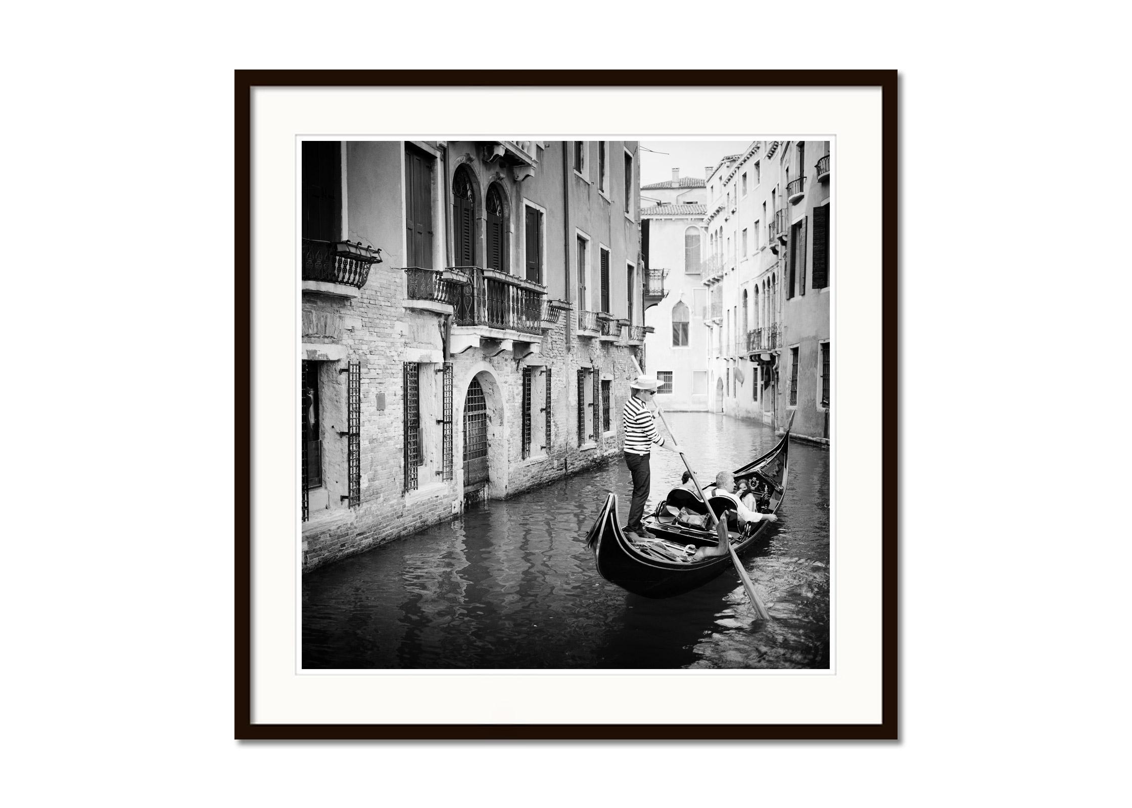 Gondoliere, Gondola, Canal, Venice, black and white art cityscape photography - Gray Landscape Photograph by Gerald Berghammer