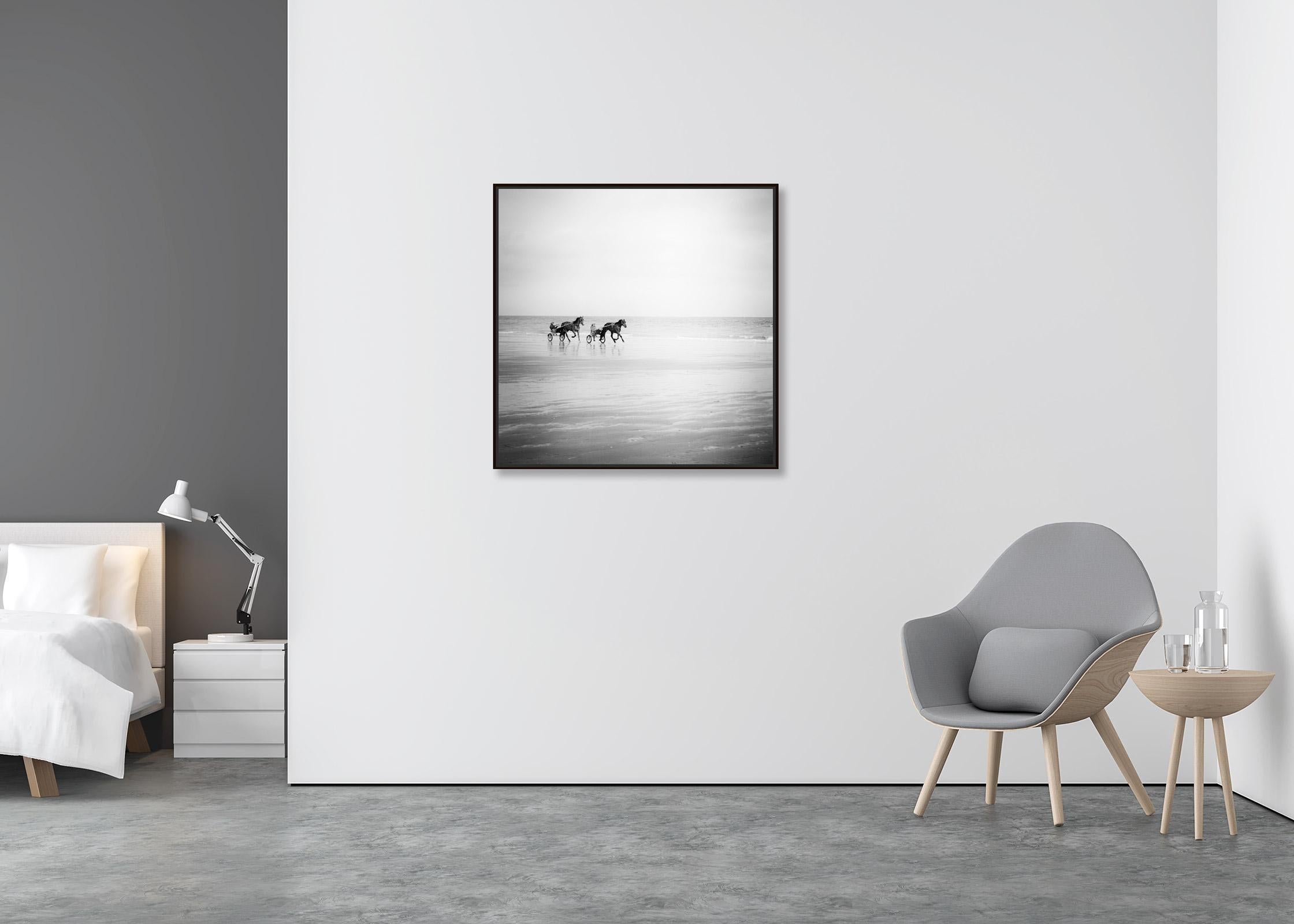 Harness Racing, horses on the beach, France, black white landscape photography - Contemporary Photograph by Gerald Berghammer