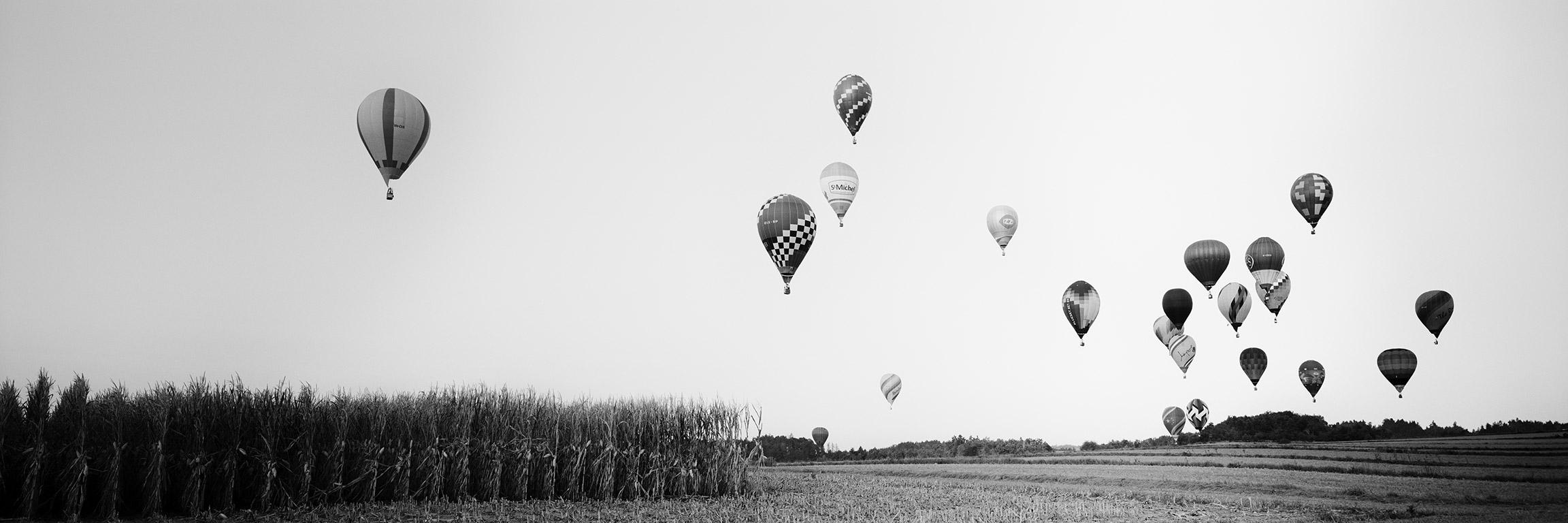 Gerald Berghammer Landscape Photograph - Hot Air Balloon Panorama, Championship, black and white photography, landscape