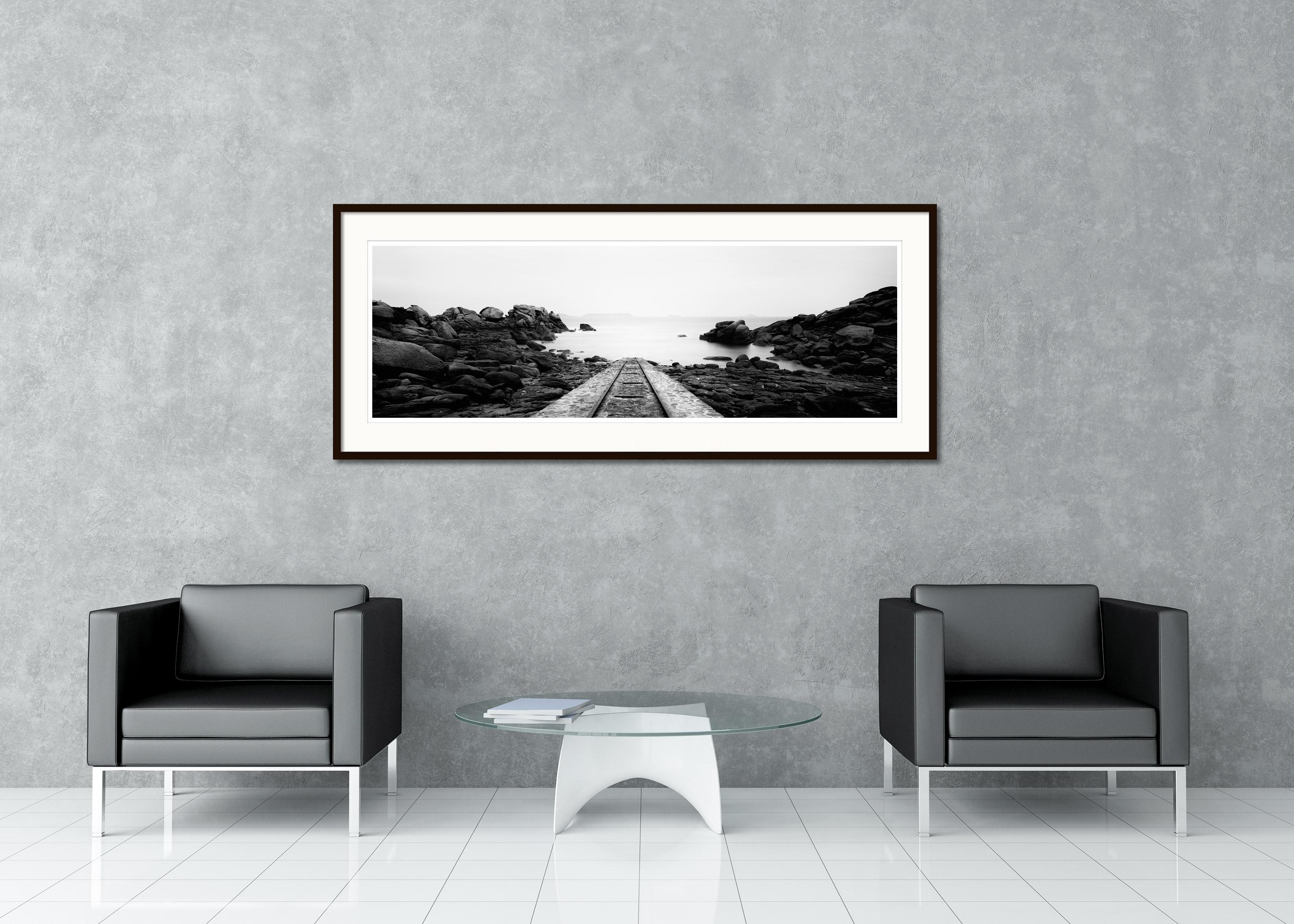 Black and white fine art long exposure panorama waterscape - landscape photography. Railway tracks in the Atlantic Ocean in France. Archival pigment ink print, edition of 9. Signed, titled, dated and numbered by artist. Certificate of authenticity