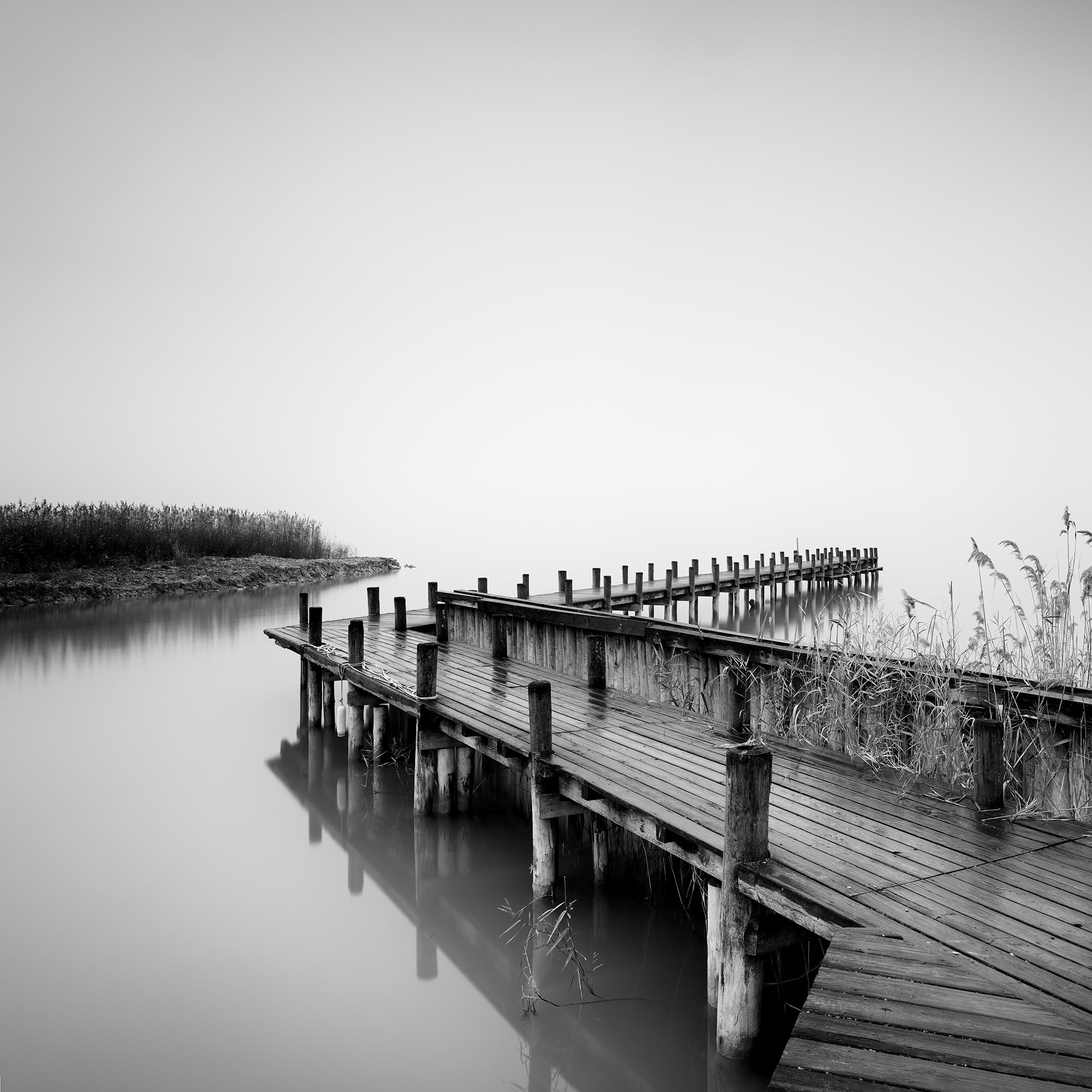 Gerald Berghammer Black and White Photograph - Jetty on calm Lake