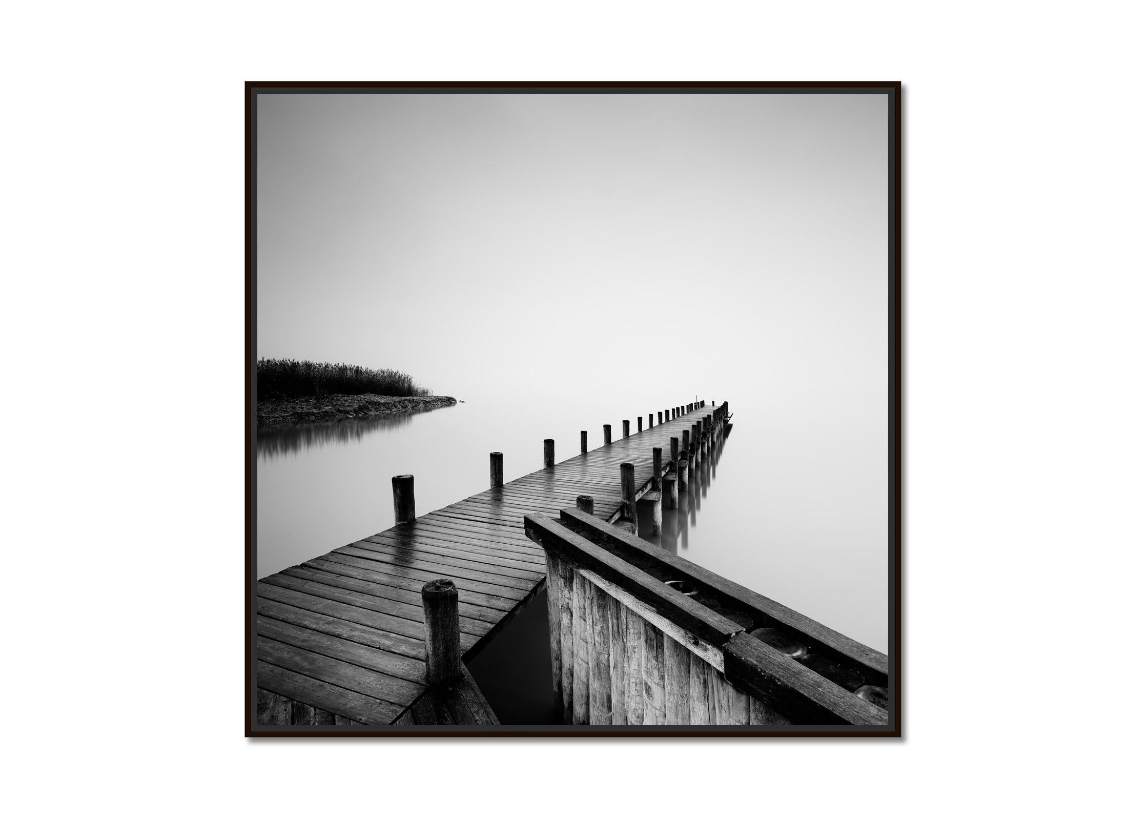 Jetty on calm Lake, silent misty morning, black and white, fine art waterscape - Photograph by Gerald Berghammer