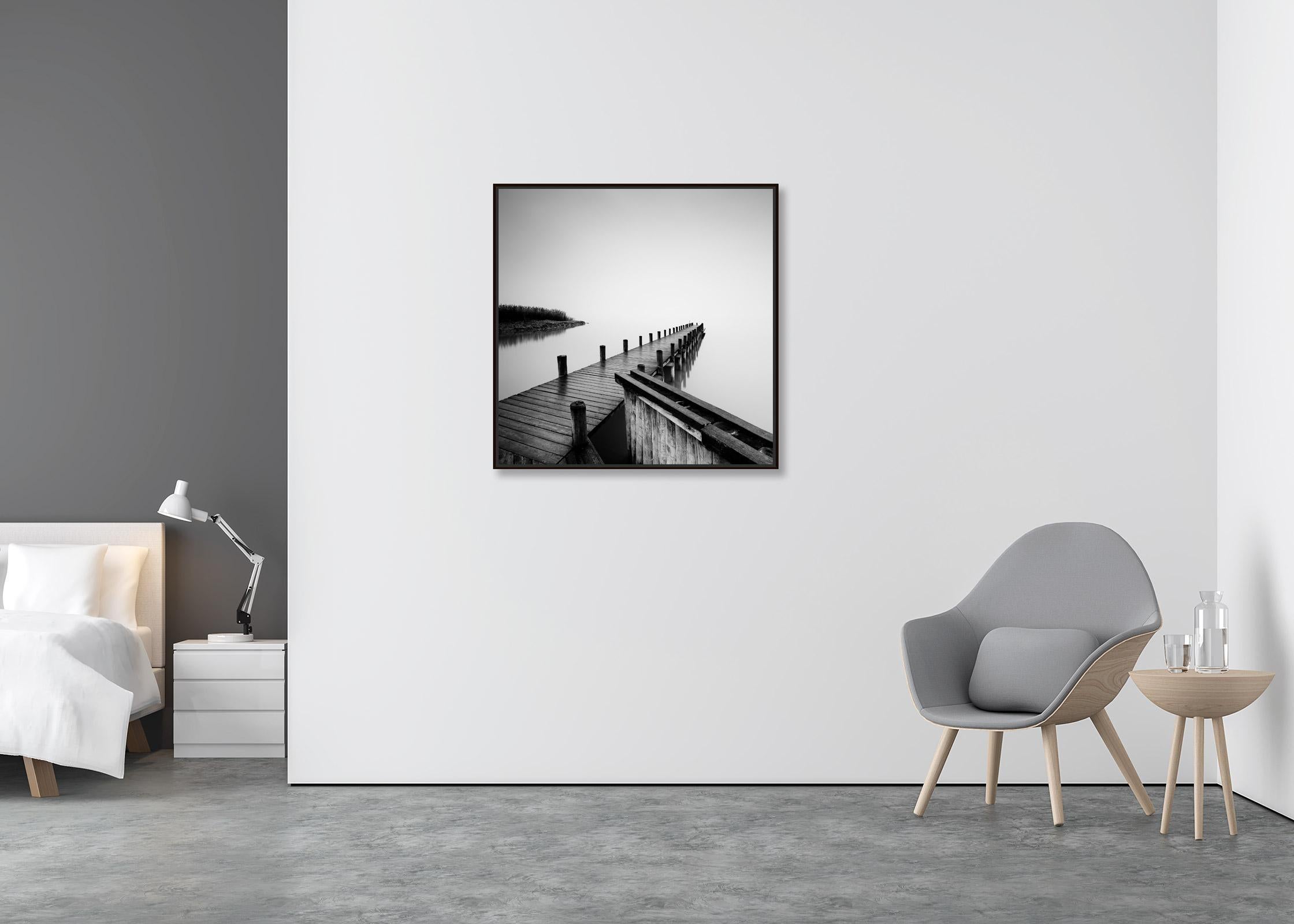 Jetty on calm Lake, silent misty morning, black and white, fine art waterscape - Contemporary Photograph by Gerald Berghammer