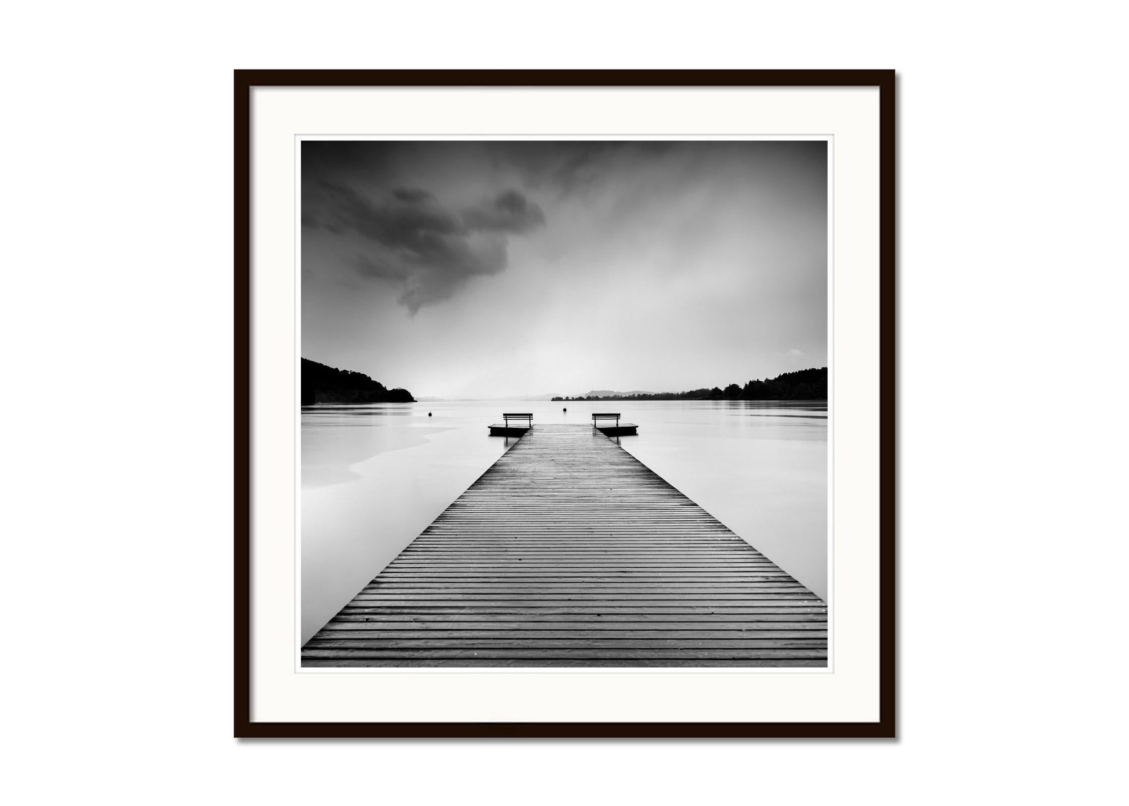 Black and white fine art landscape photography. Jetty with benches on a rainy day at the beautiful Wallersee in Salzburg, Austria. Archival pigment ink print, edition of 7. Signed, titled, dated and numbered by artist. Certificate of authenticity