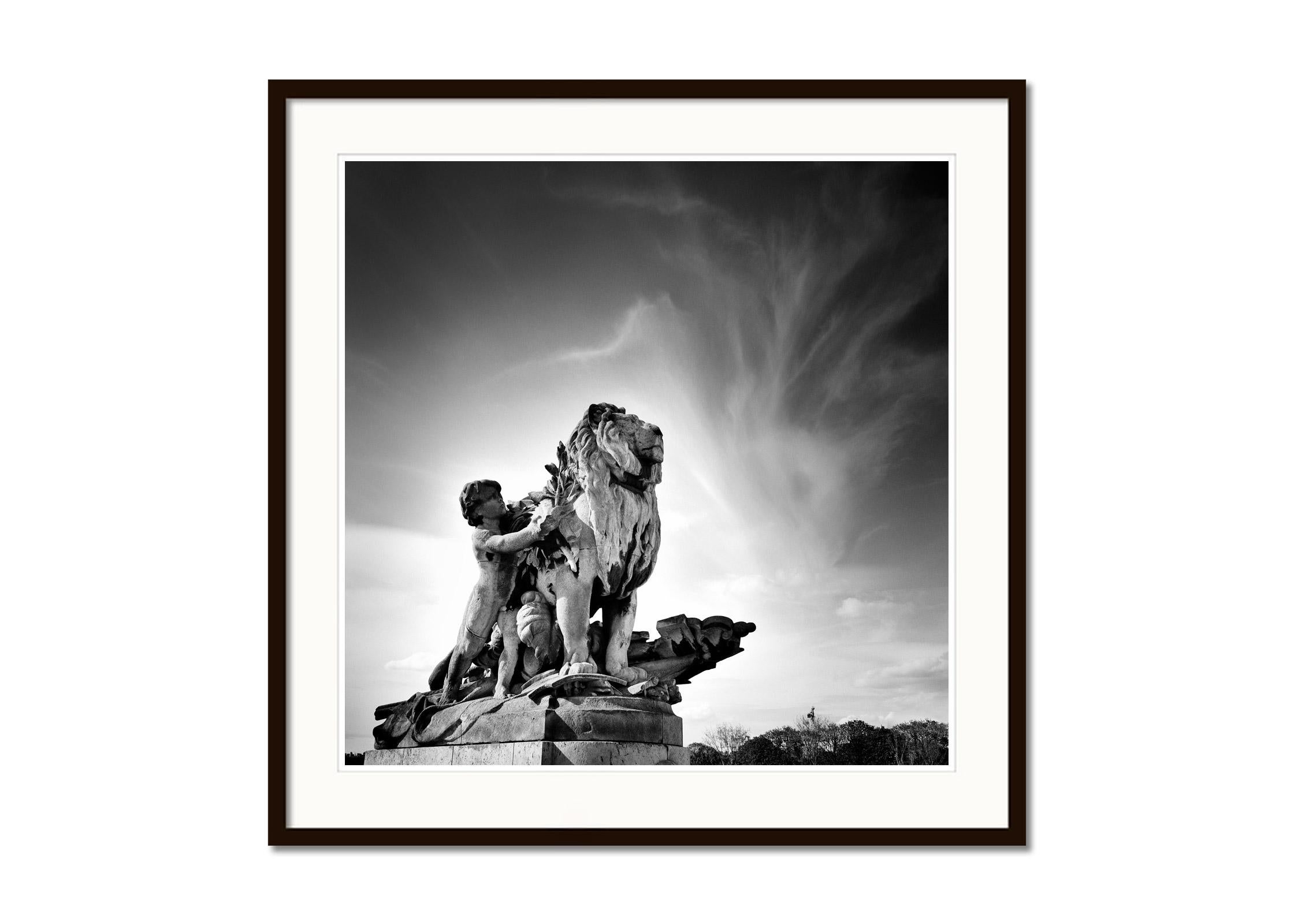 Lion a l'Enfant Statue, Pont Alexandre, Paris, black and white photography - Gray Black and White Photograph by Gerald Berghammer