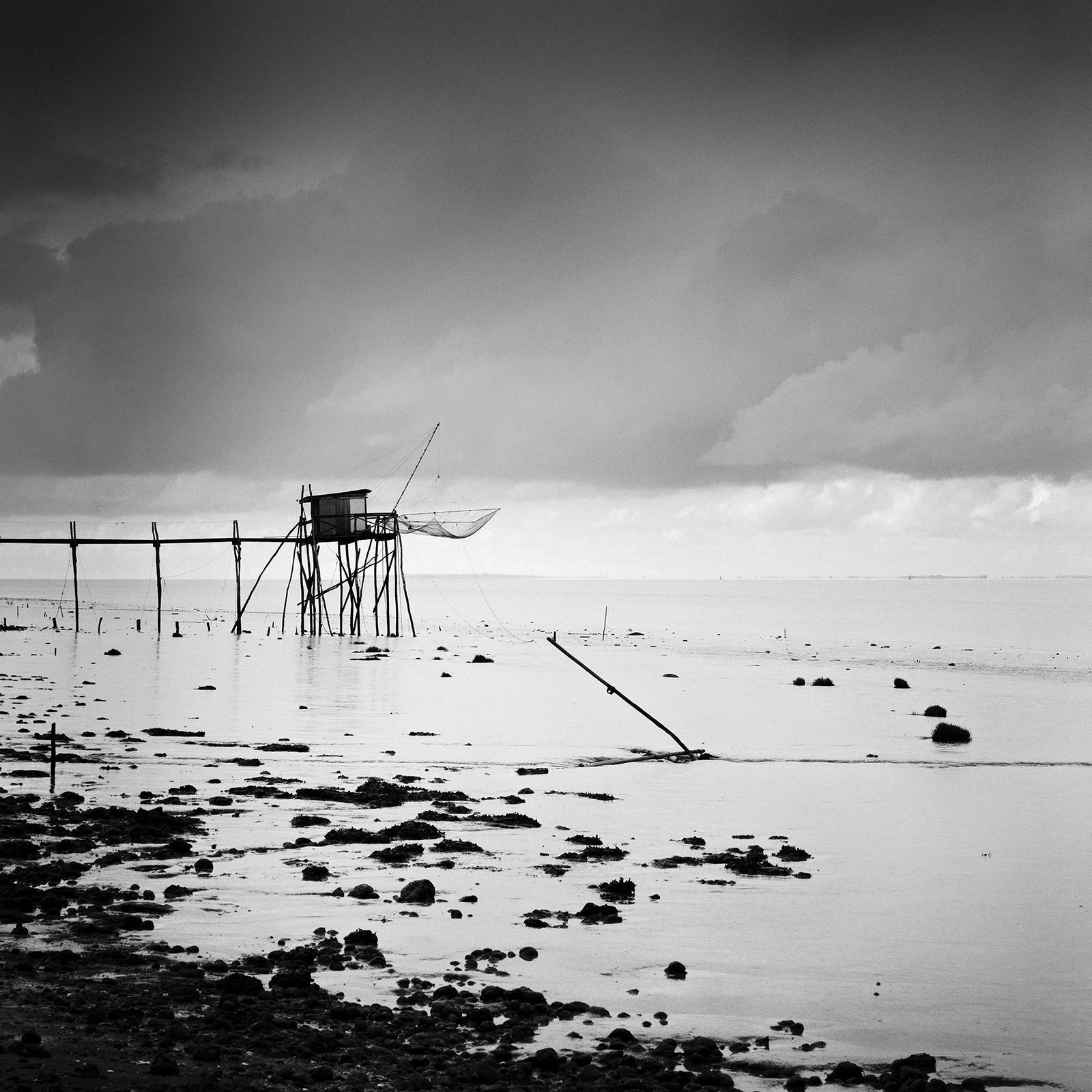 Gerald Berghammer Landscape Photograph - Low tide Fishing, Stilt House, sunset, France,  blackwhite landscape photography