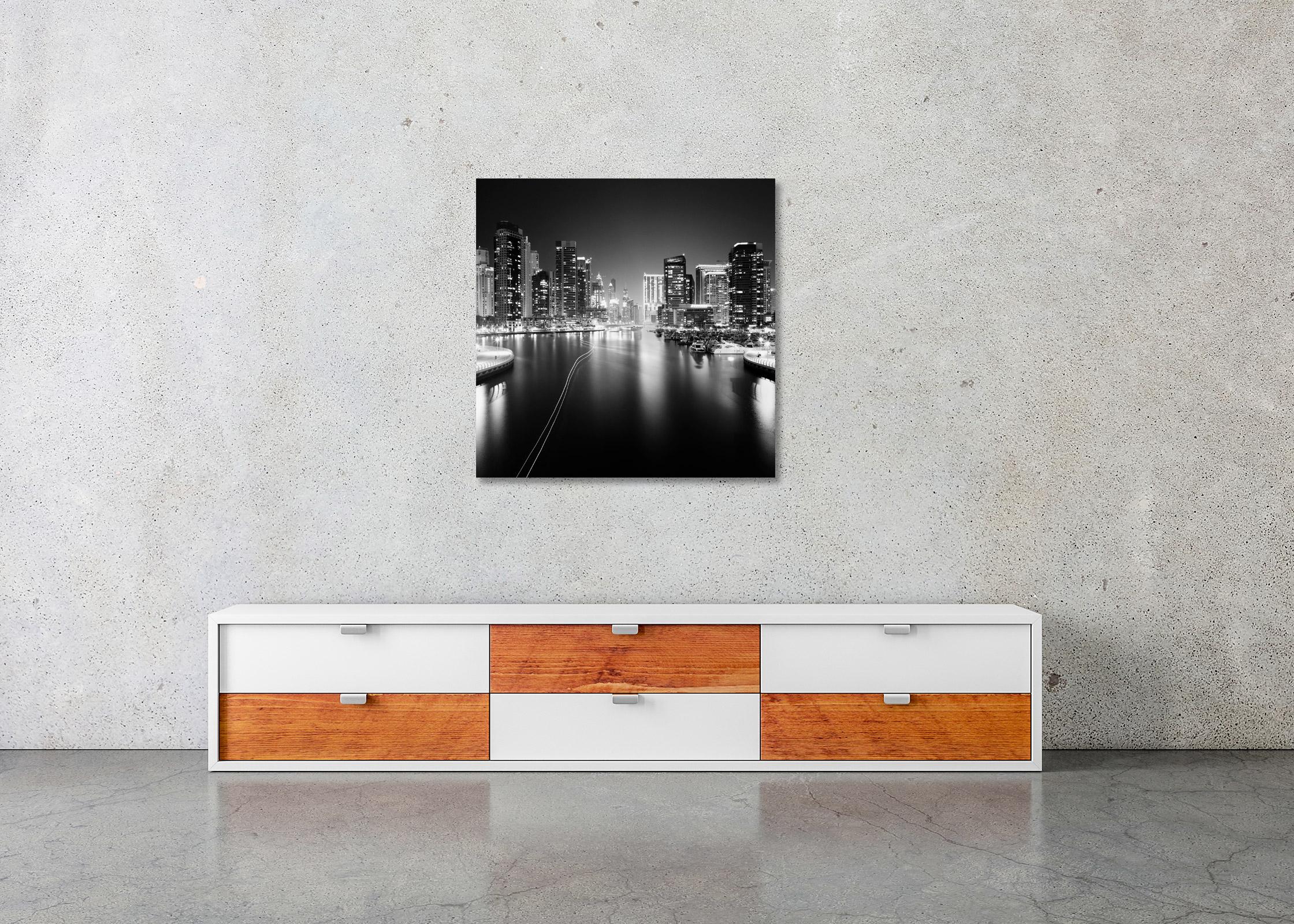 Black and White Fine Art Photography - Night view of skyscraper in Dubai Marina and Boats, Yachts. Archival pigment ink print, edition of 9. Signed, titled, dated and numbered by artist. Certificate of authenticity included. Printed with 4cm white