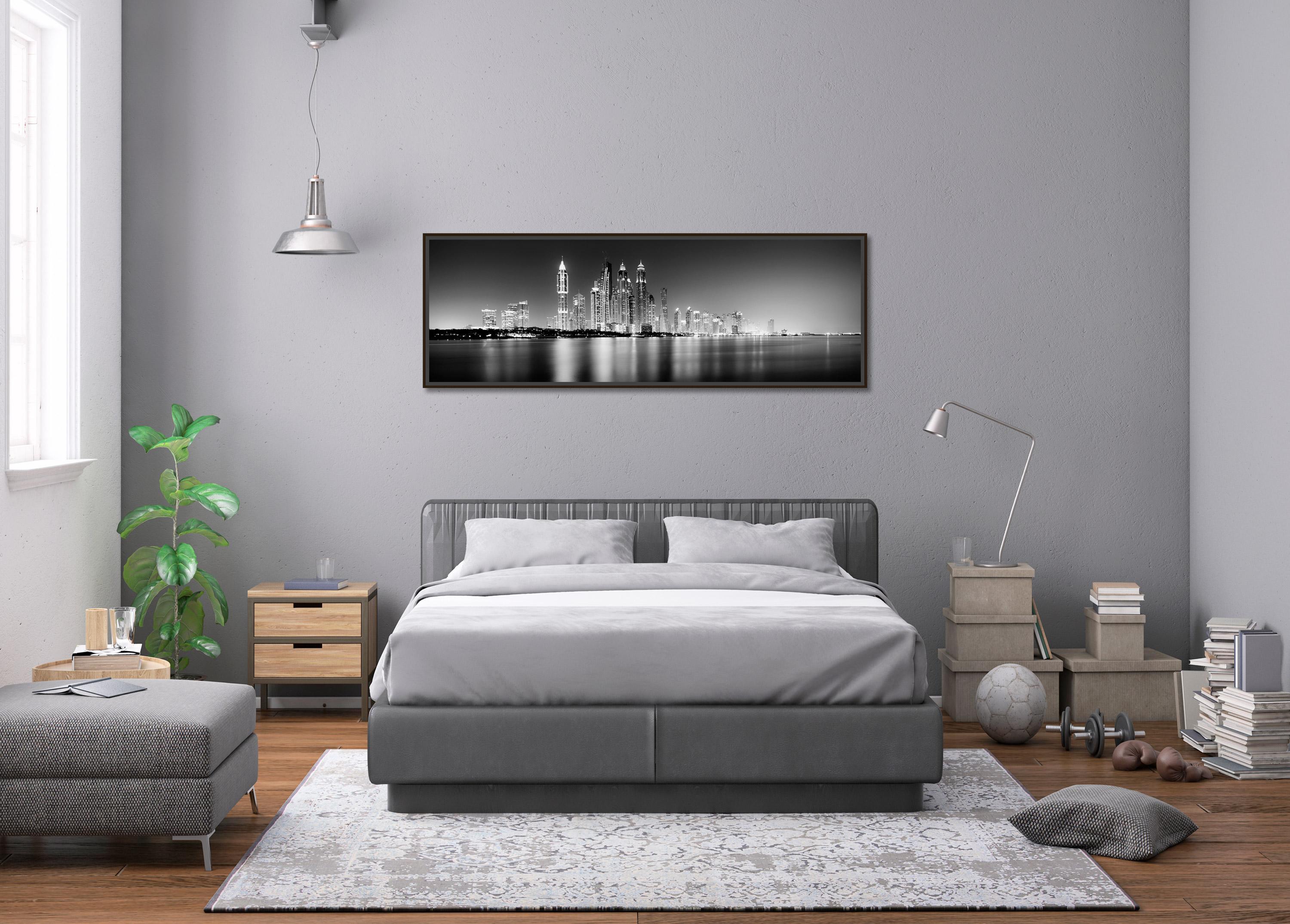 Black and white fine art panorama seascape - cityscape - landscape photography. Impressive skyline of Dubai with the port and the skyscrapers at night. Archival pigment ink print, edition of 9. Signed, titled, dated and numbered by artist.