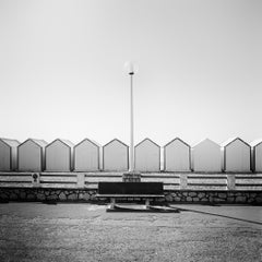 julia berghammer Minimalist Black and White Photograph of Beach Huts and Bench, Limited Edition