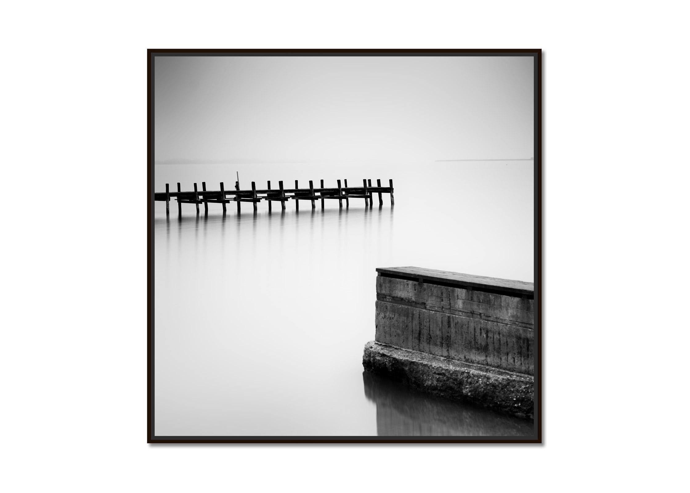 Misty morning on the Lake, Jetty, Pier, black and white photography, landscape - Photograph by Gerald Berghammer