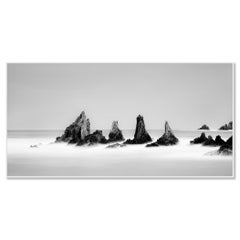 Monochrome Long-Exposure Seascape Photograph – Rocky Peaks Panorama – Spain