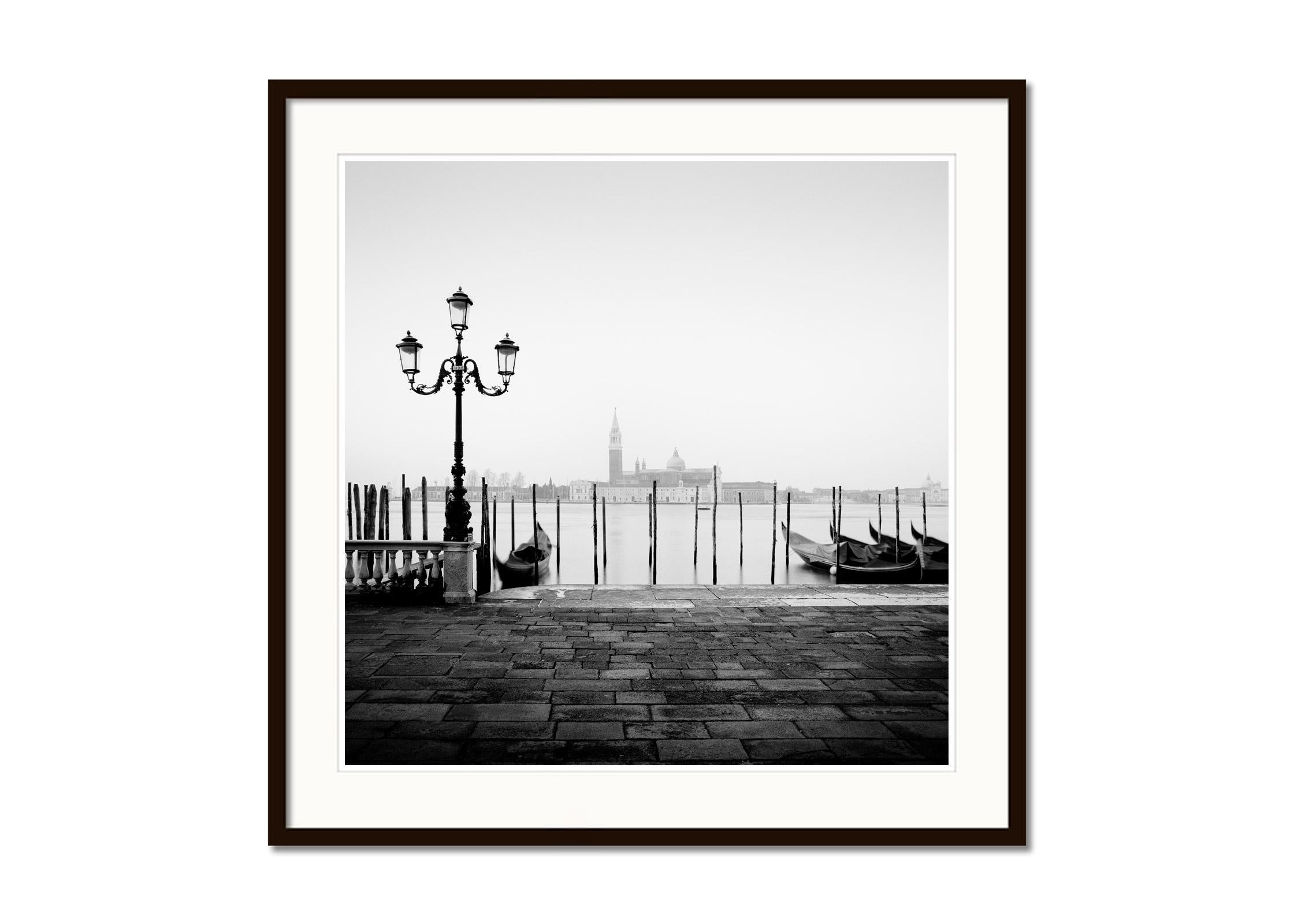 Black and White Fine Art Landscape Photography. Beautiful view of traditional Gondola on Canal Grande with Basilica di Santa Maria della Salute in the background, Venice, Italy. Archival pigment ink print, edition of 9. Signed, titled, dated and