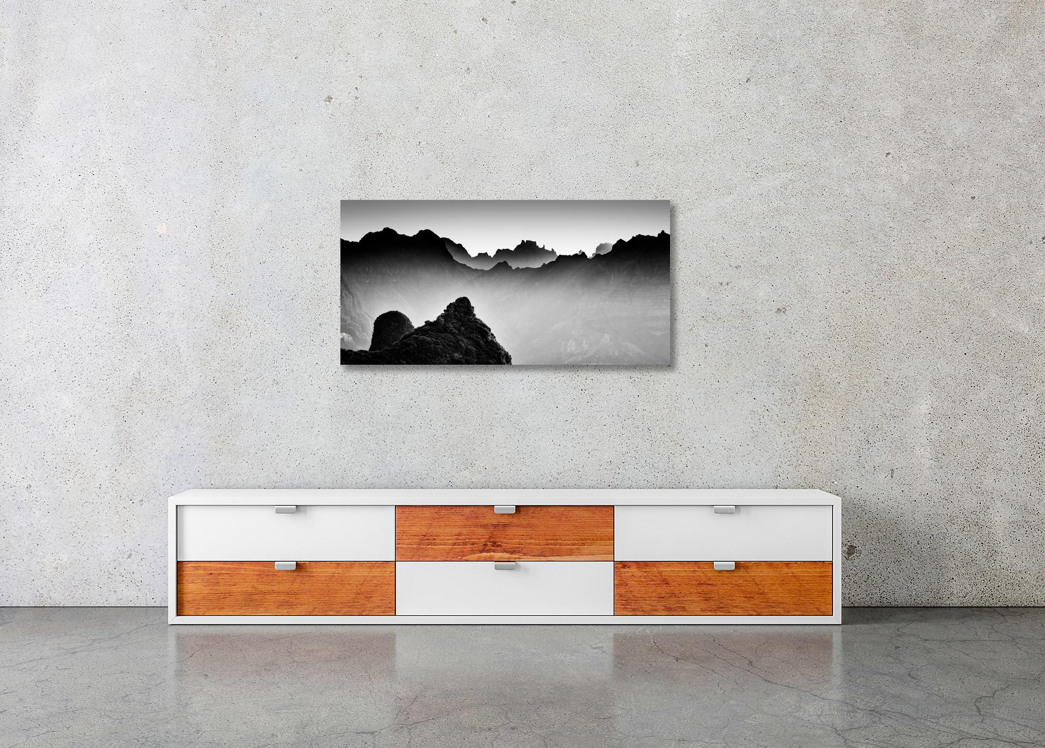 Black and White Fine Art Photography. Mountain panorama in morning light on madeira island, Portugal, edition of 7. Signed, titled, dated and numbered by artist. Certificate of authenticity included. Printed with 4cm white border.
International