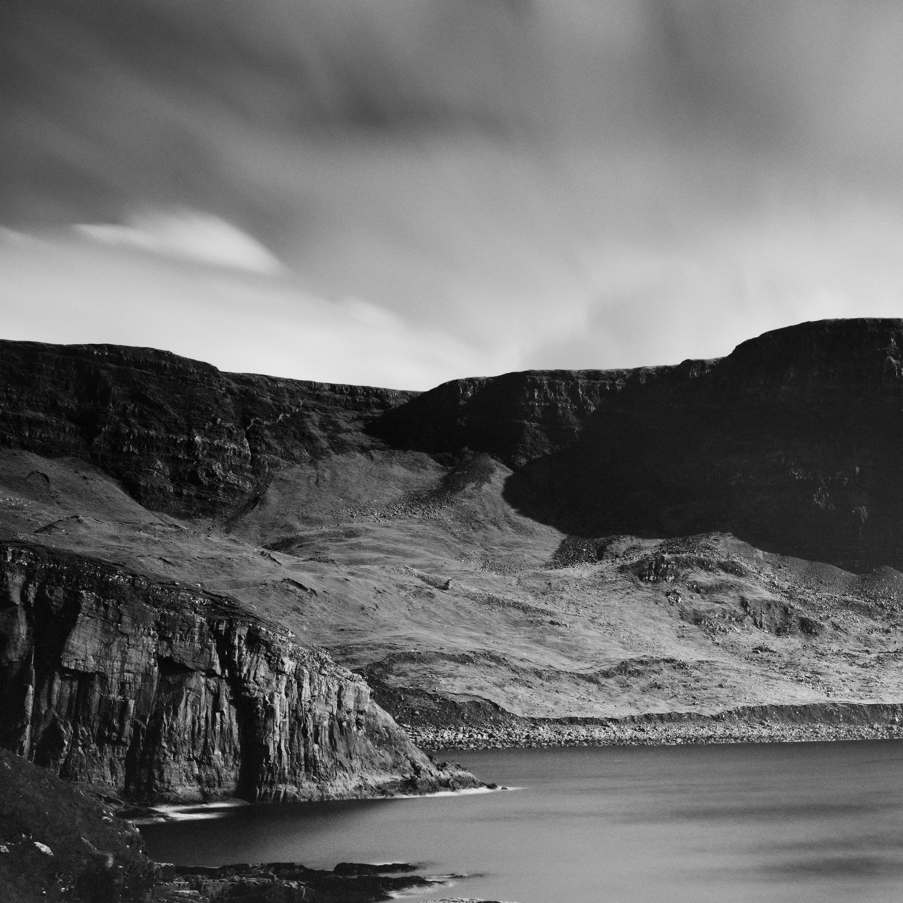 Black and White Fine Art Panorama photography - Neist point panorama with the shoreline and the mountains in stormy weather. Archival pigment ink print, edition of 9. Signed, titled, dated and numbered by artist. Certificate of authenticity