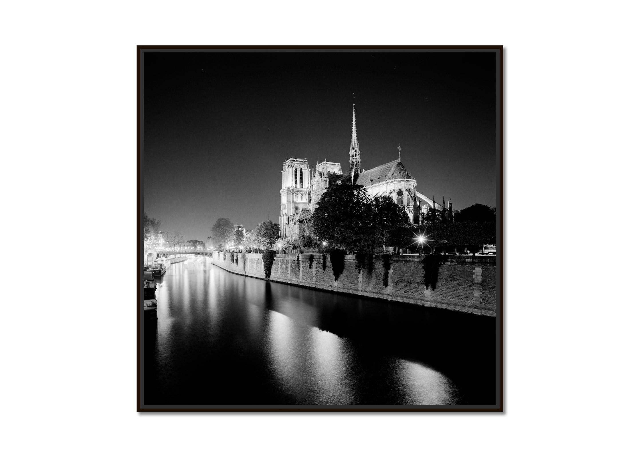Notre Dame Cathedral Night Paris France black and white cityscape photography - Photograph by Gerald Berghammer