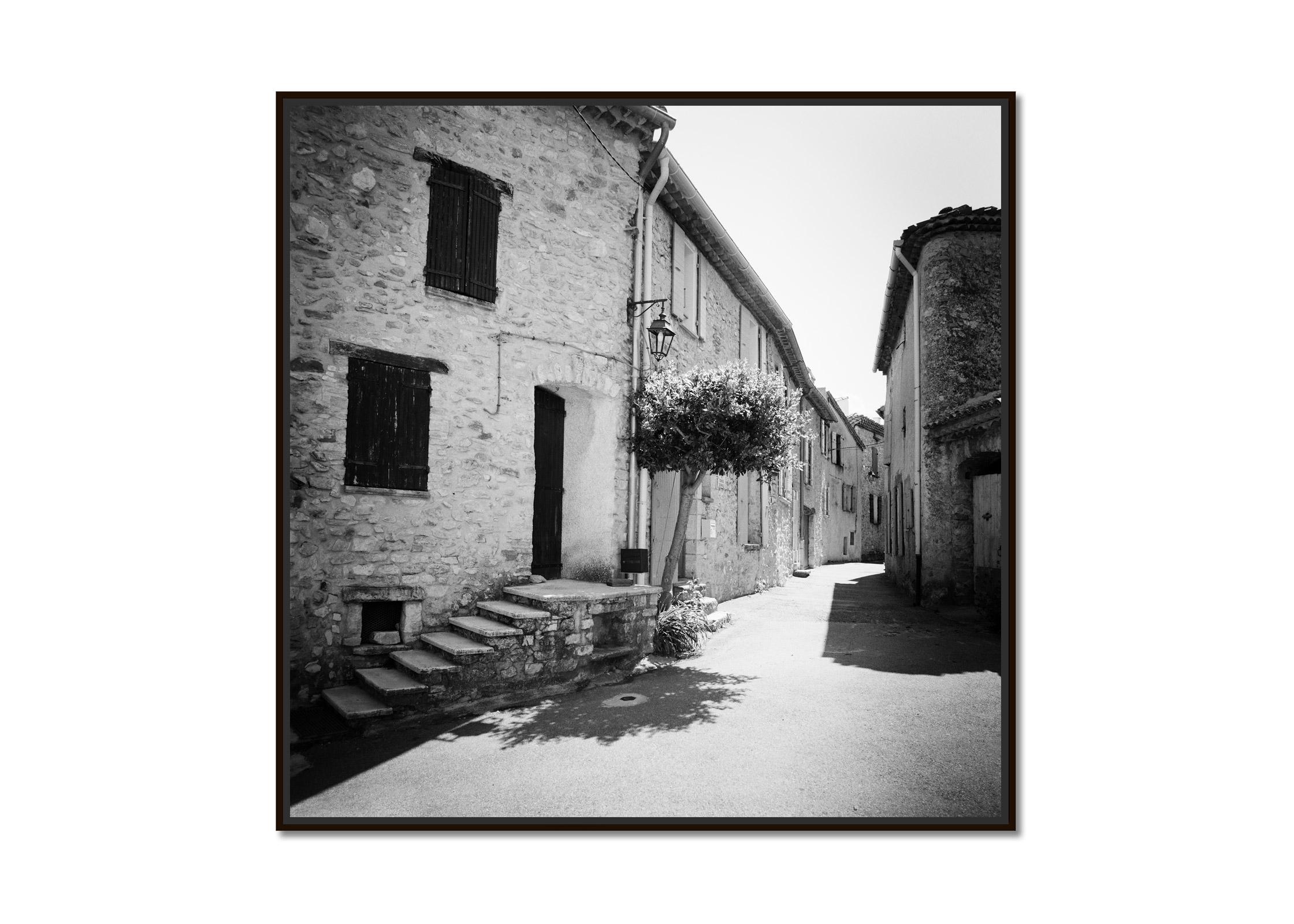 Old alley with old stone Houses, France, black white art landscape photography - Photograph by Gerald Berghammer