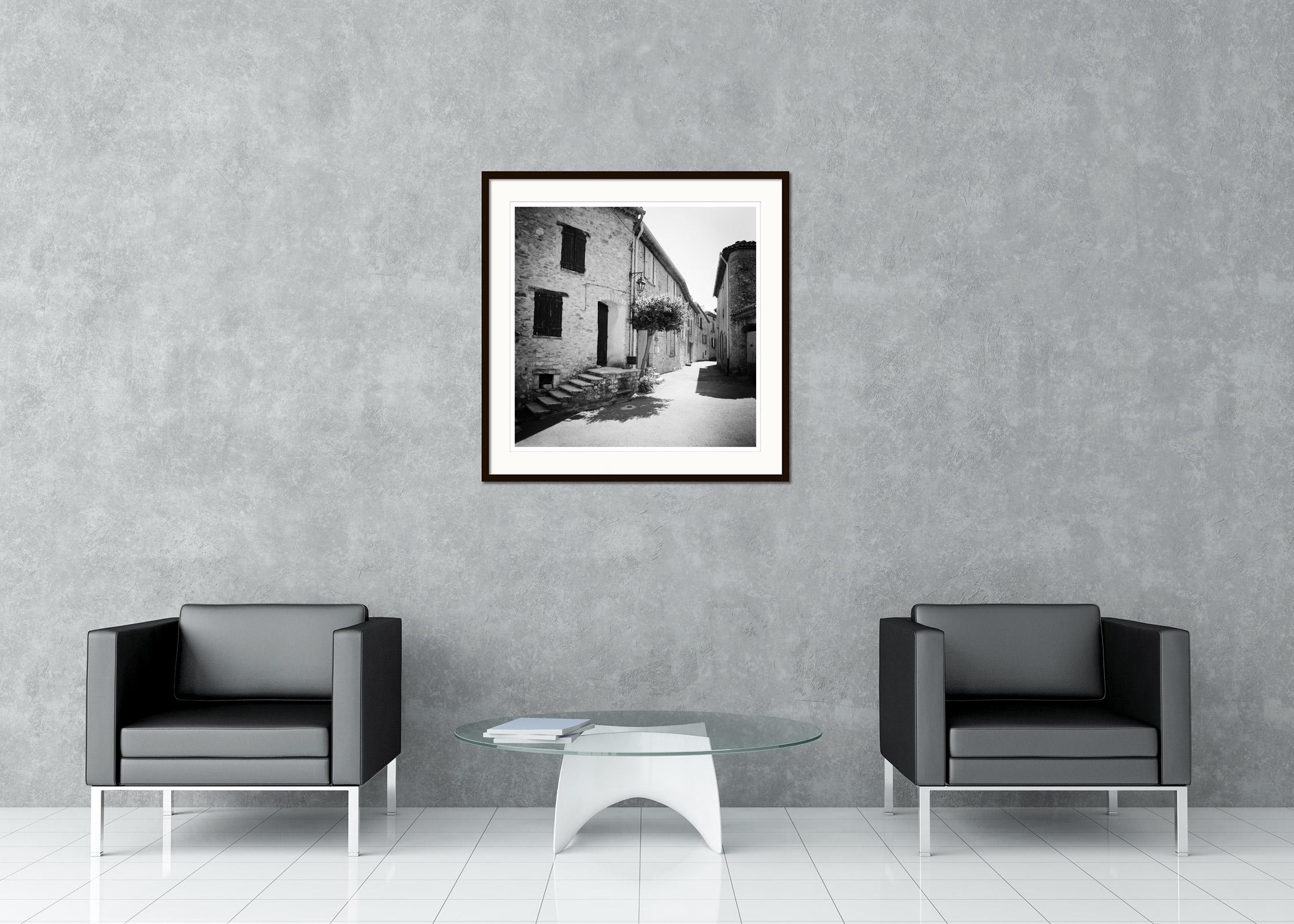 Old alley with old stone Houses, France, black white art landscape photography - Contemporary Photograph by Gerald Berghammer