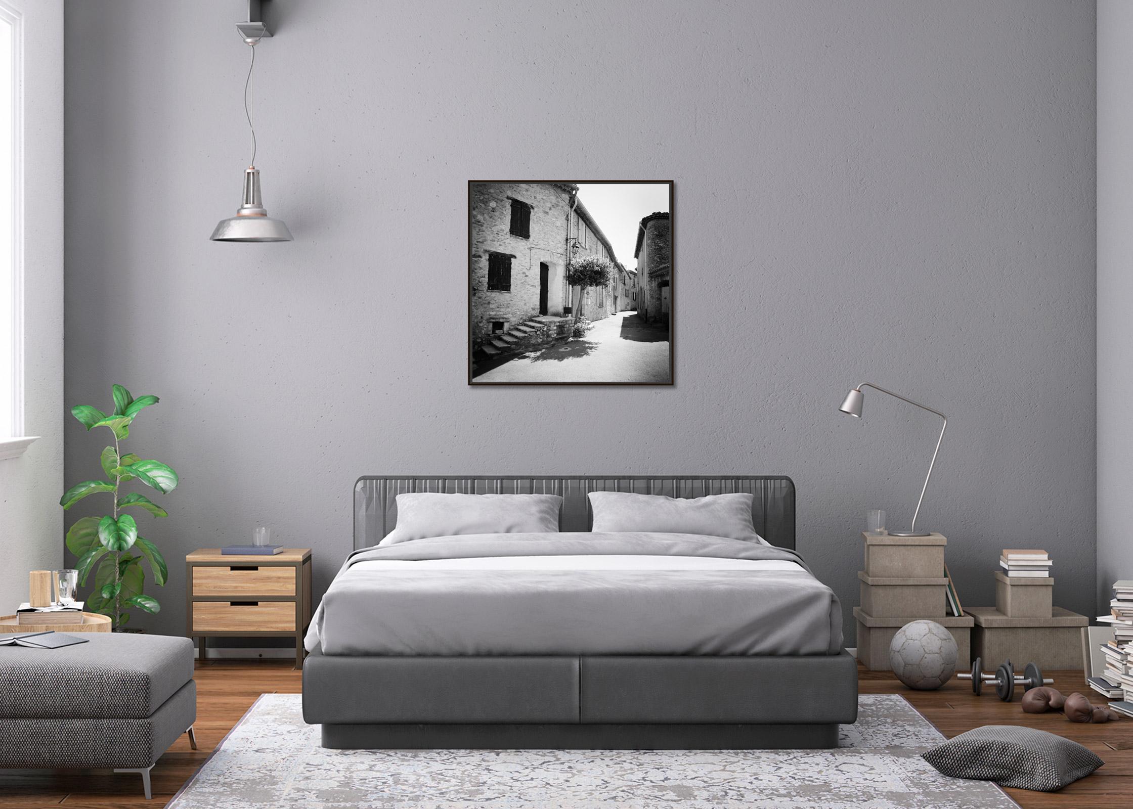 Old alley with old stone Houses, France, black white art landscape photography - Gray Landscape Photograph by Gerald Berghammer