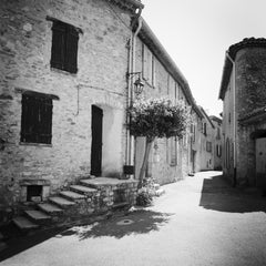 Old alley with old stone Houses, France, black white art landscape photography