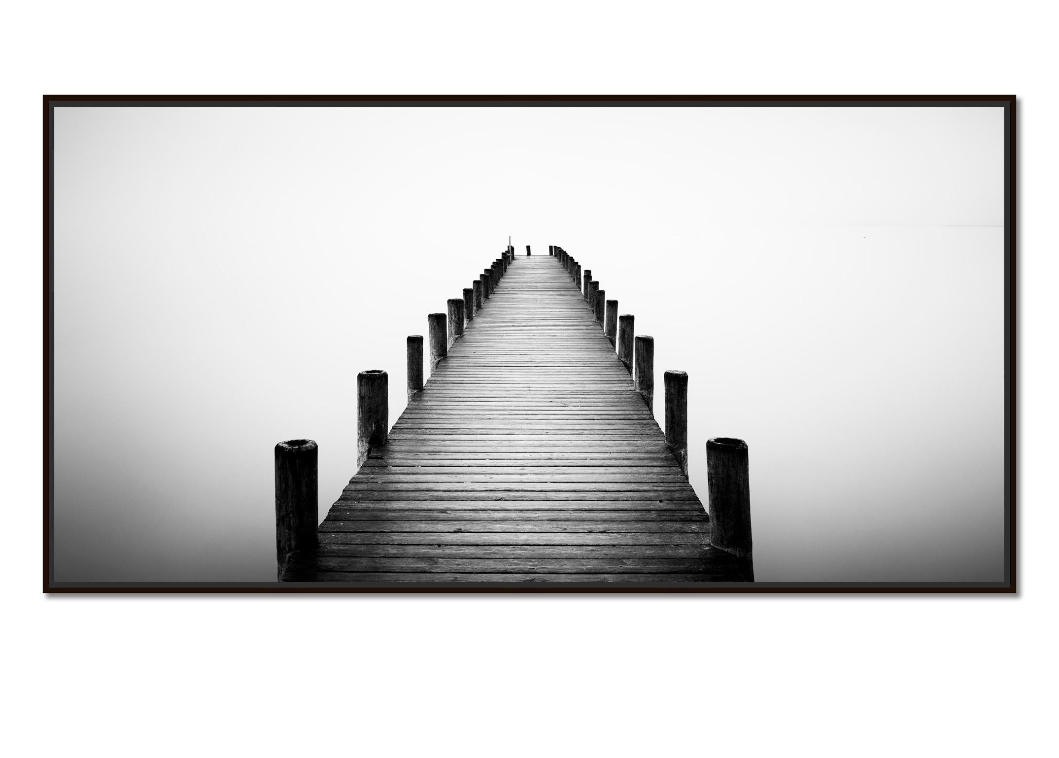 Pier on misty Lake Panorama, black and white long exposure waterscape art photo - Photograph by Gerald Berghammer