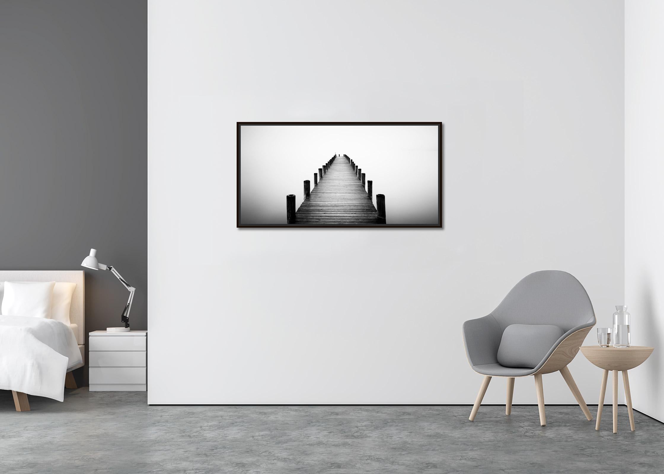 Pier on misty Lake Panorama, black and white long exposure waterscape art photo - Contemporary Photograph by Gerald Berghammer