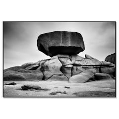 Pink Granite Coast Rock Formations — Minimalist Black-and-White Photograph