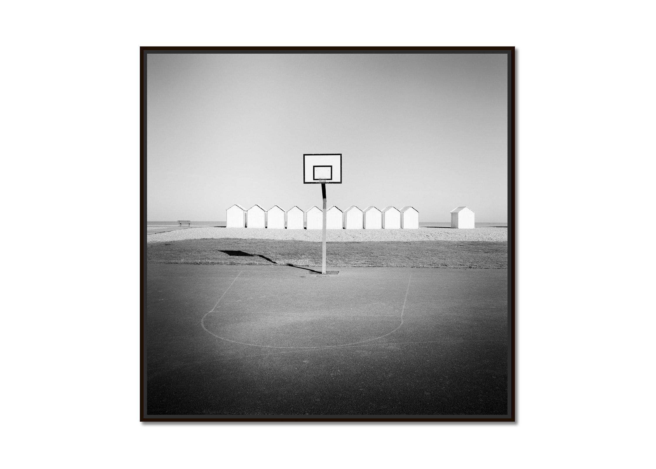 Playground, Beach Huts, Basketball, France, black white landscape photography - Photograph by Gerald Berghammer