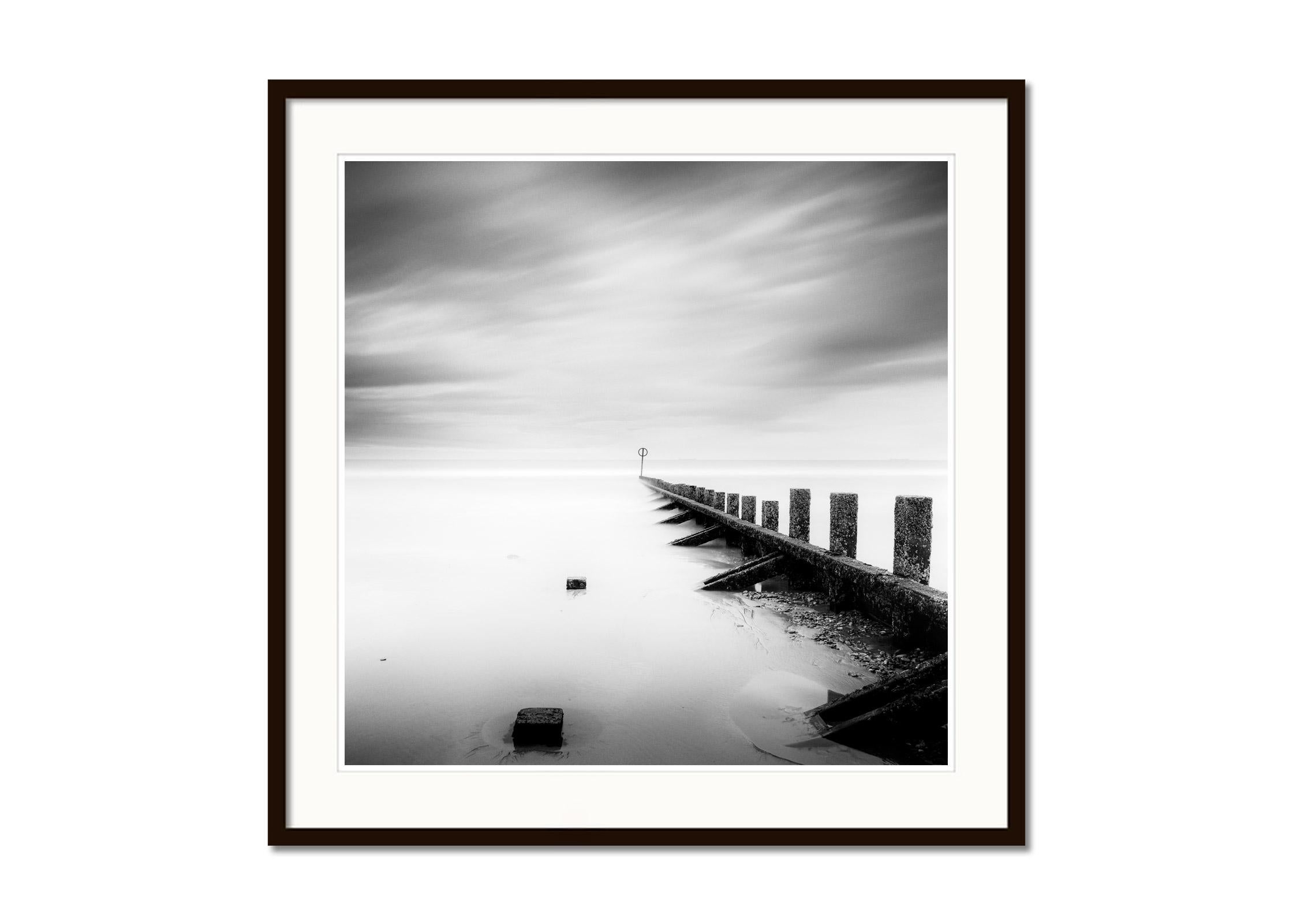 Pointing the Way, Wavebreaker, Scotland, black and white photography, landscape - Gray Black and White Photograph by Gerald Berghammer