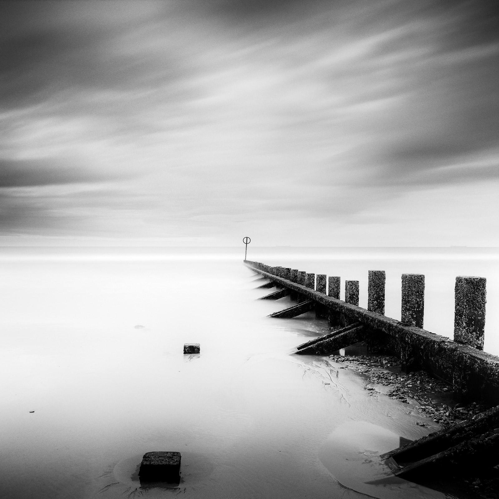 Gerald Berghammer Black and White Photograph - Pointing the Way, Wavebreaker, Scotland, black and white photography, landscape