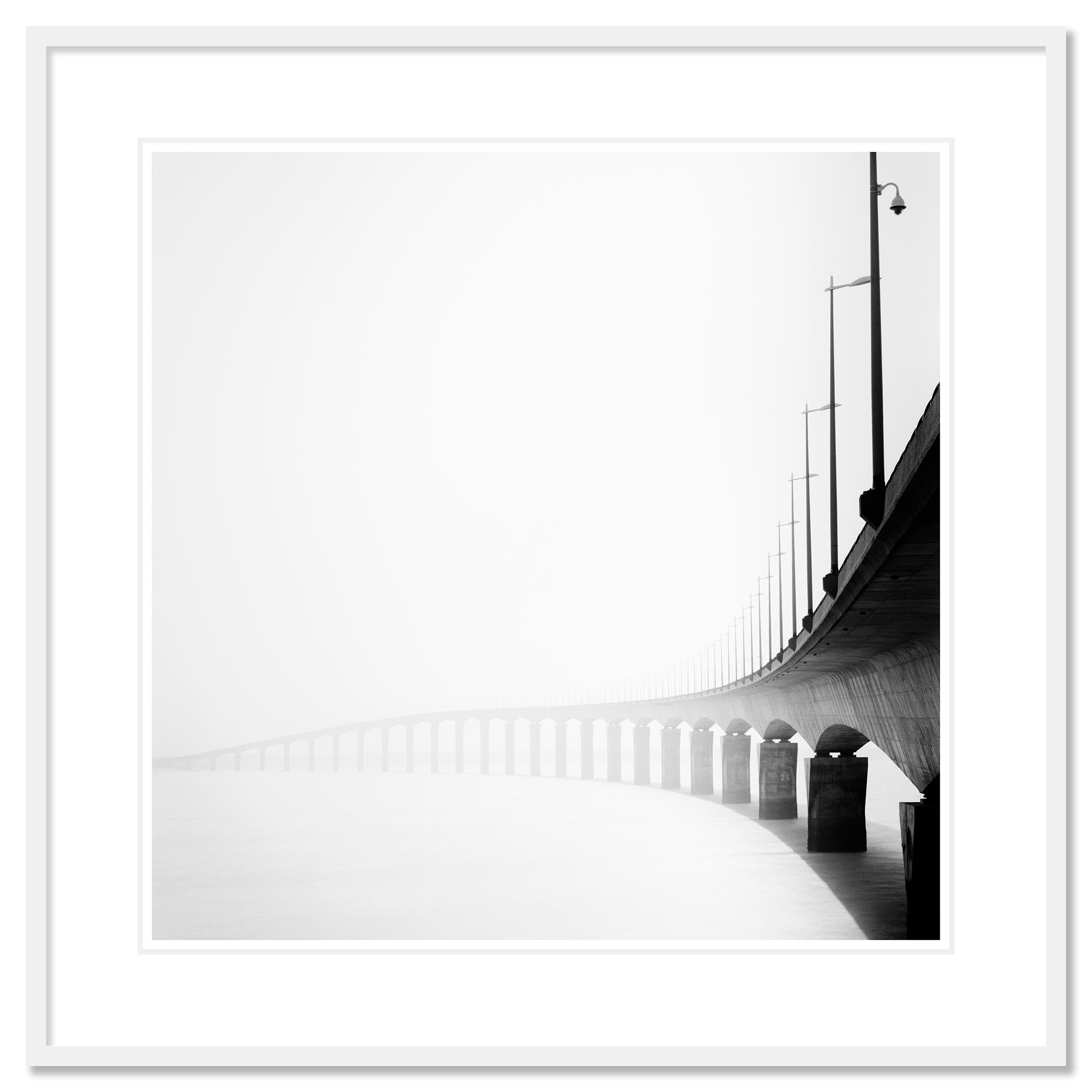 Black and White Fine Art landscape photography. Ile de Re bridge over the sea with fog, France. Archival pigment ink print, edition of 9. Signed, titled, dated and numbered by artist. Certificate of authenticity included. Printed with 4cm white