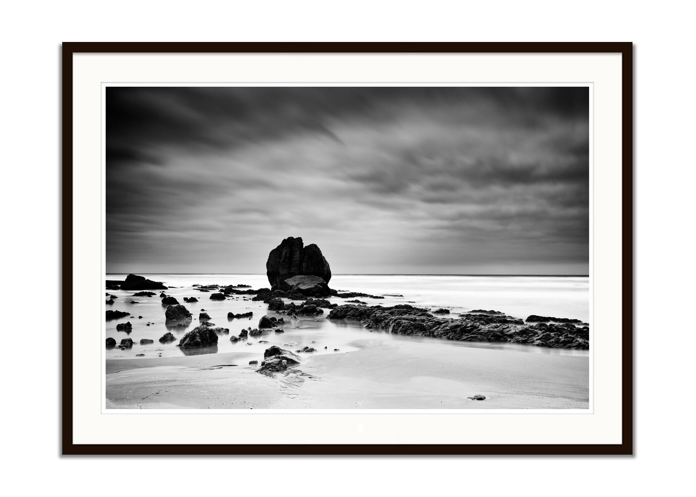 Black and white fine art panorama long exposure waterscape - landscape photography print. Giant rocks on the sandy beach of the Atlantic coast in France. Archival pigment ink print, edition of 8. Signed, titled, dated and numbered by artist.