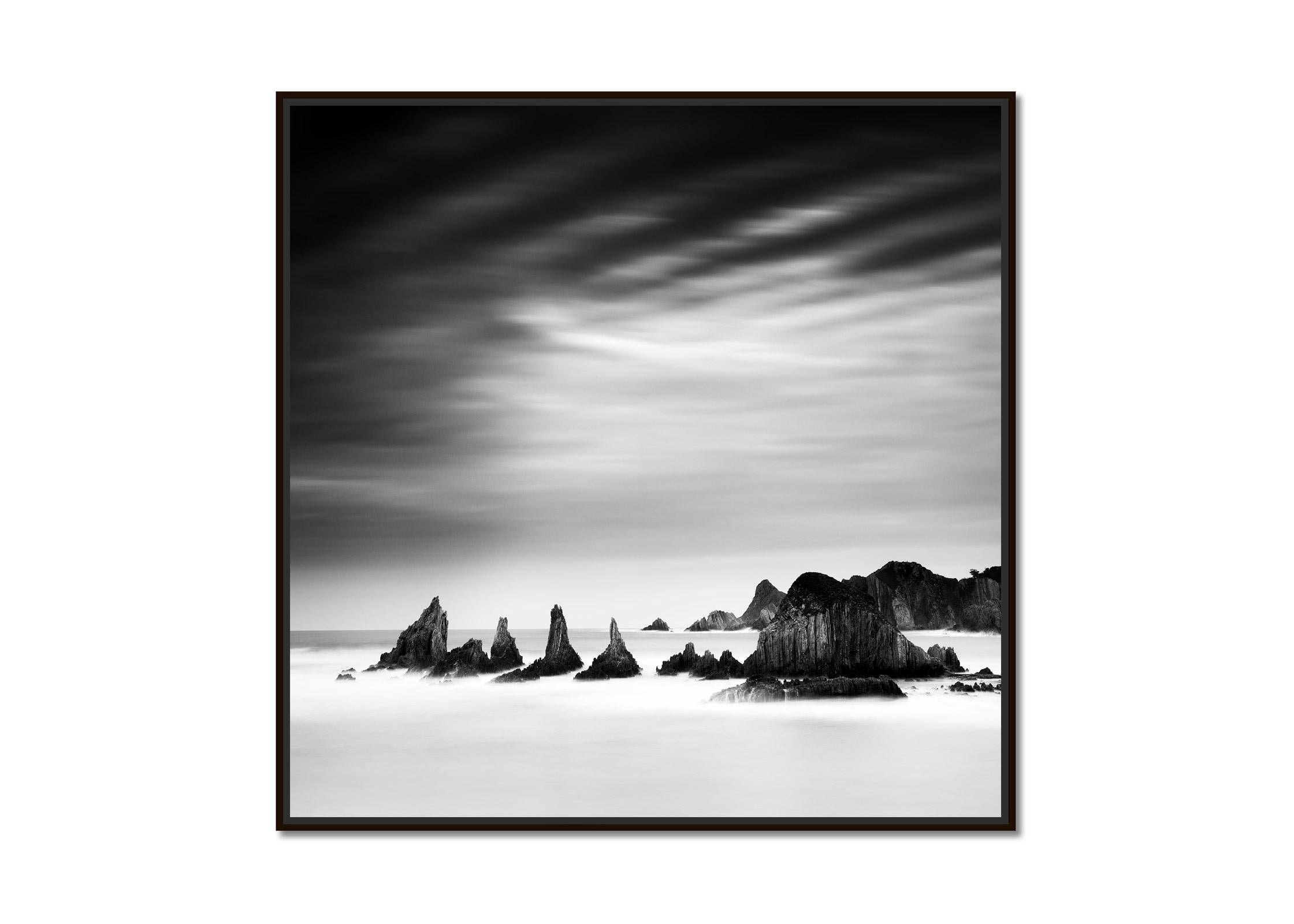 Rocky Peaks, mystical clouds, shoreline, black and white photograpy, seascape - Photograph by Gerald Berghammer
