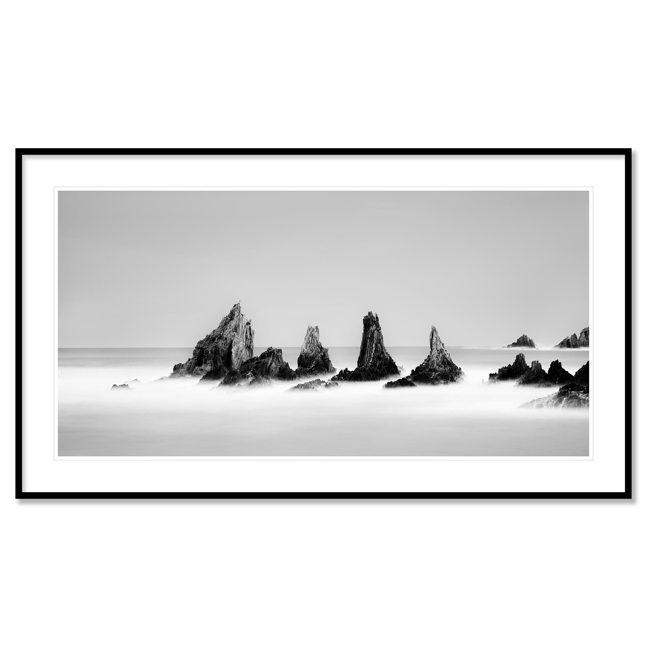 
Rocky Peaks Panorama Study 2, Spain - no. 21192 • Black and white fine art long exposure waterscape photography. Pigment ink print as part of a limited edition of 8. Art Prints are made to order in limited editions on Hahnemuehle Photo Rag Baryta.
