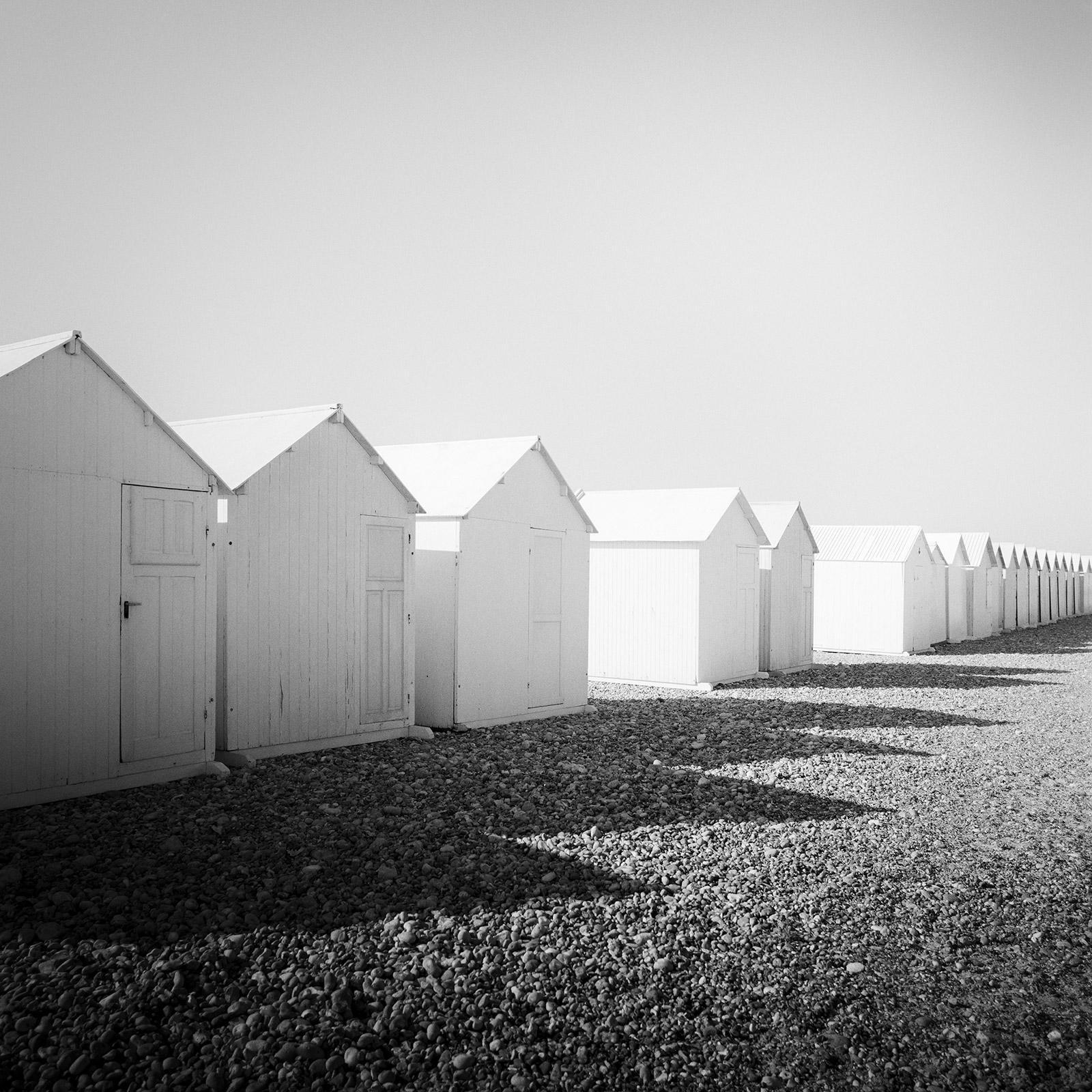 Row of Beach Huts, rocky beach, Black and White fine art landscape photography