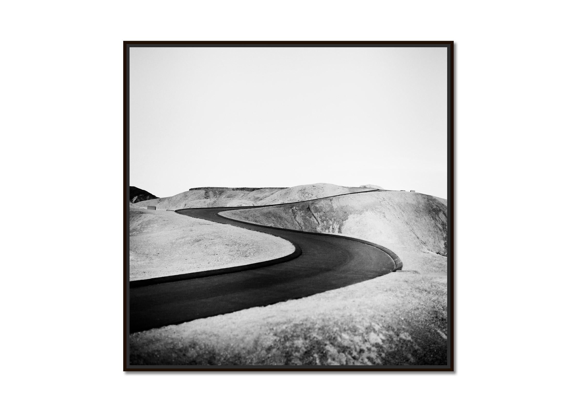 S Curve Shaped Road, Death Valley, California, USA, black and white landscape - Photograph by Gerald Berghammer