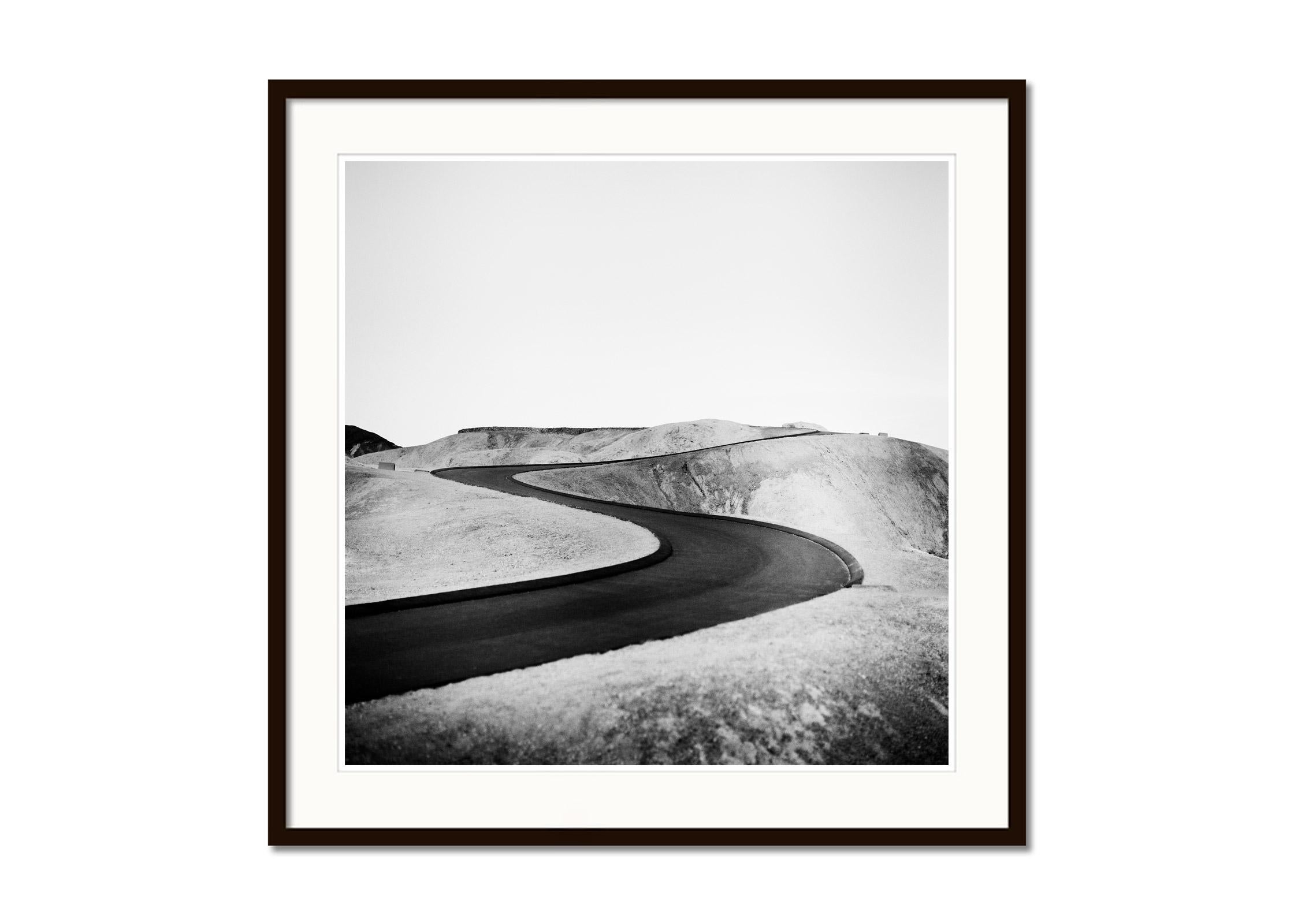 S Curve Shaped Road, Death Valley, California, USA, black and white landscape - Gray Black and White Photograph by Gerald Berghammer