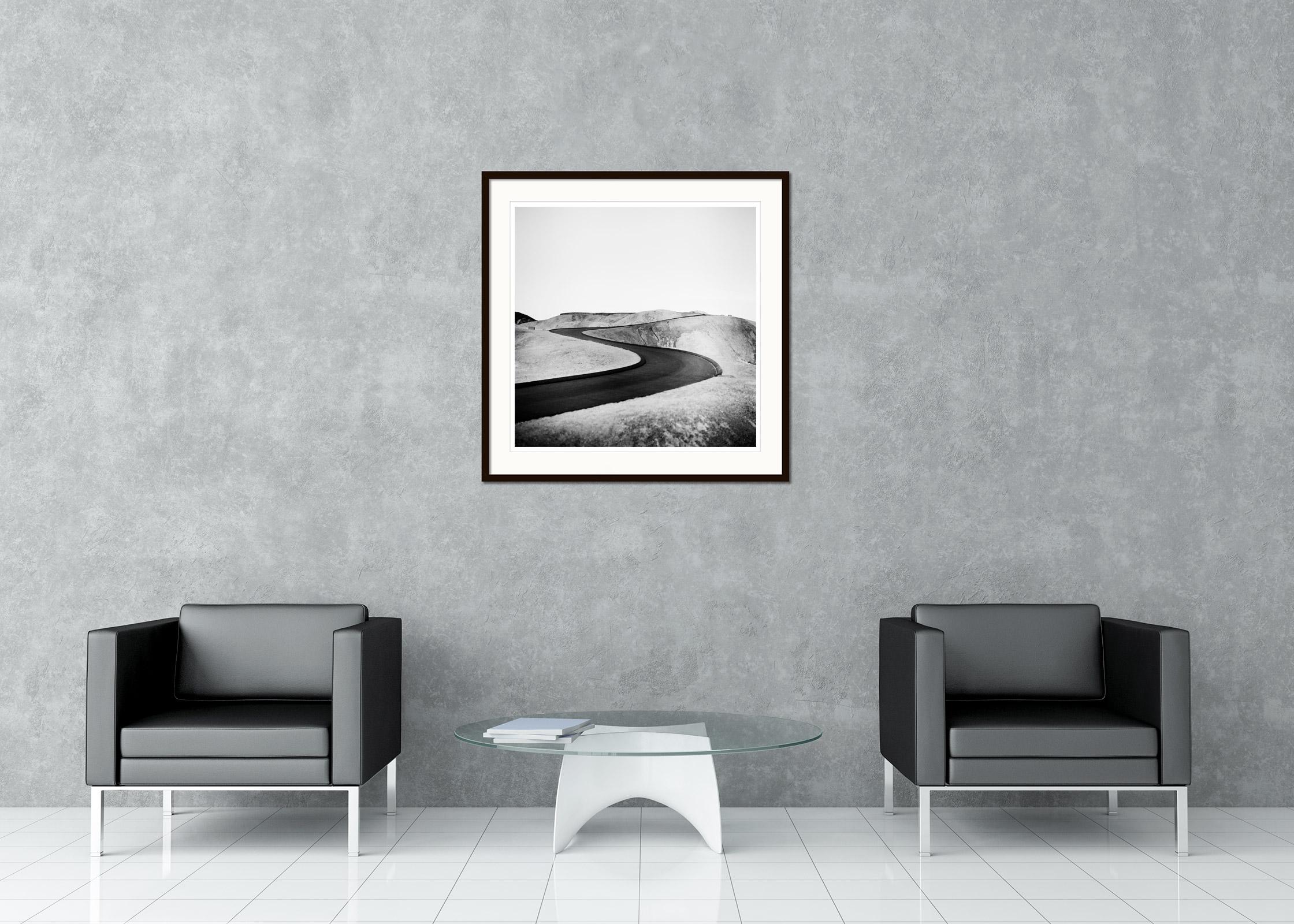 Black and white fine art landscape photography. S curved road on the way to the Death Valley, California, USA. Archival pigment ink print, edition of 9. Signed, titled, dated and numbered by artist. Certificate of authenticity included. Printed with