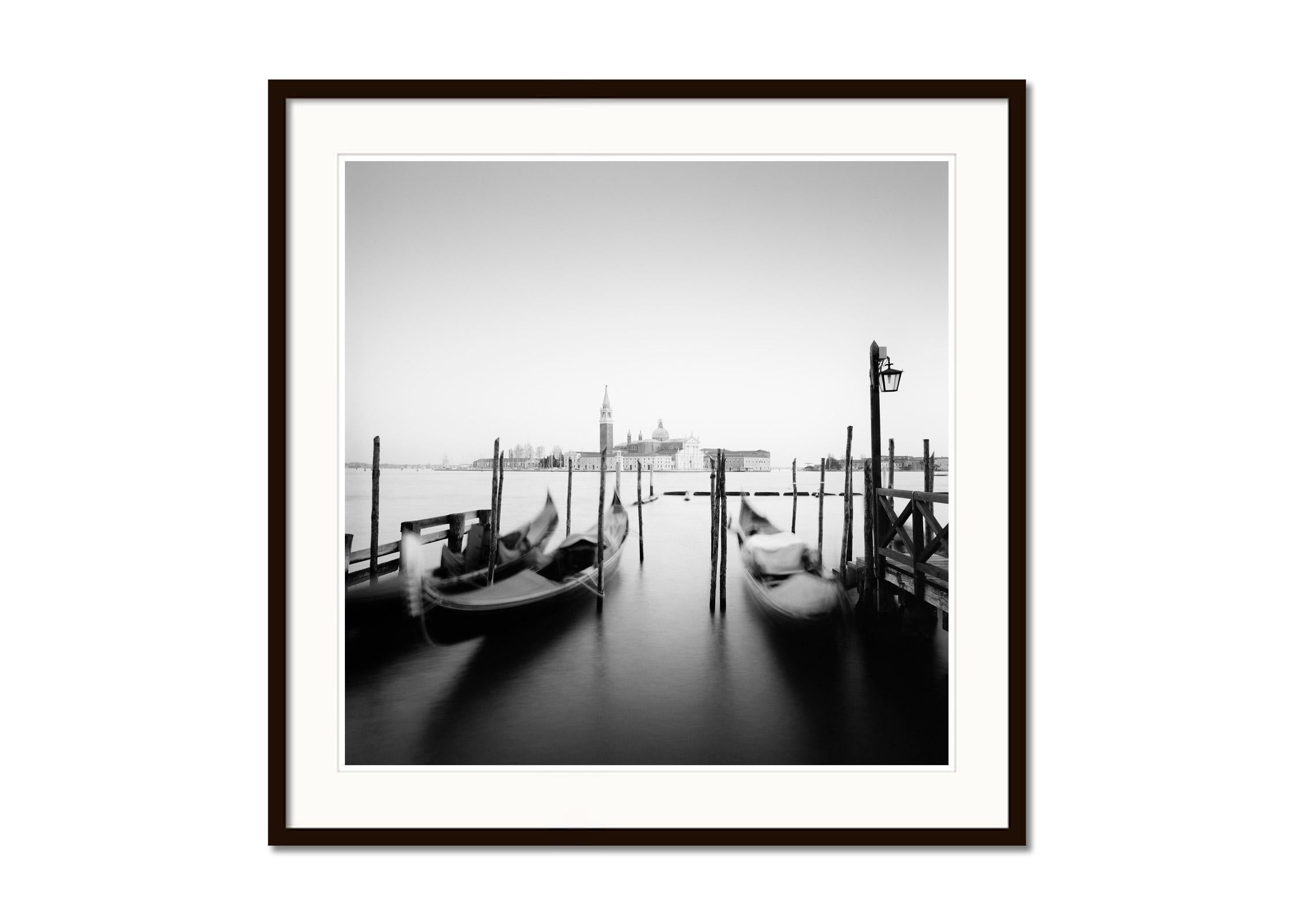 Santa Maria della Salute, Gondola, Venice, black and white cityscape photography - Gray Black and White Photograph by Gerald Berghammer