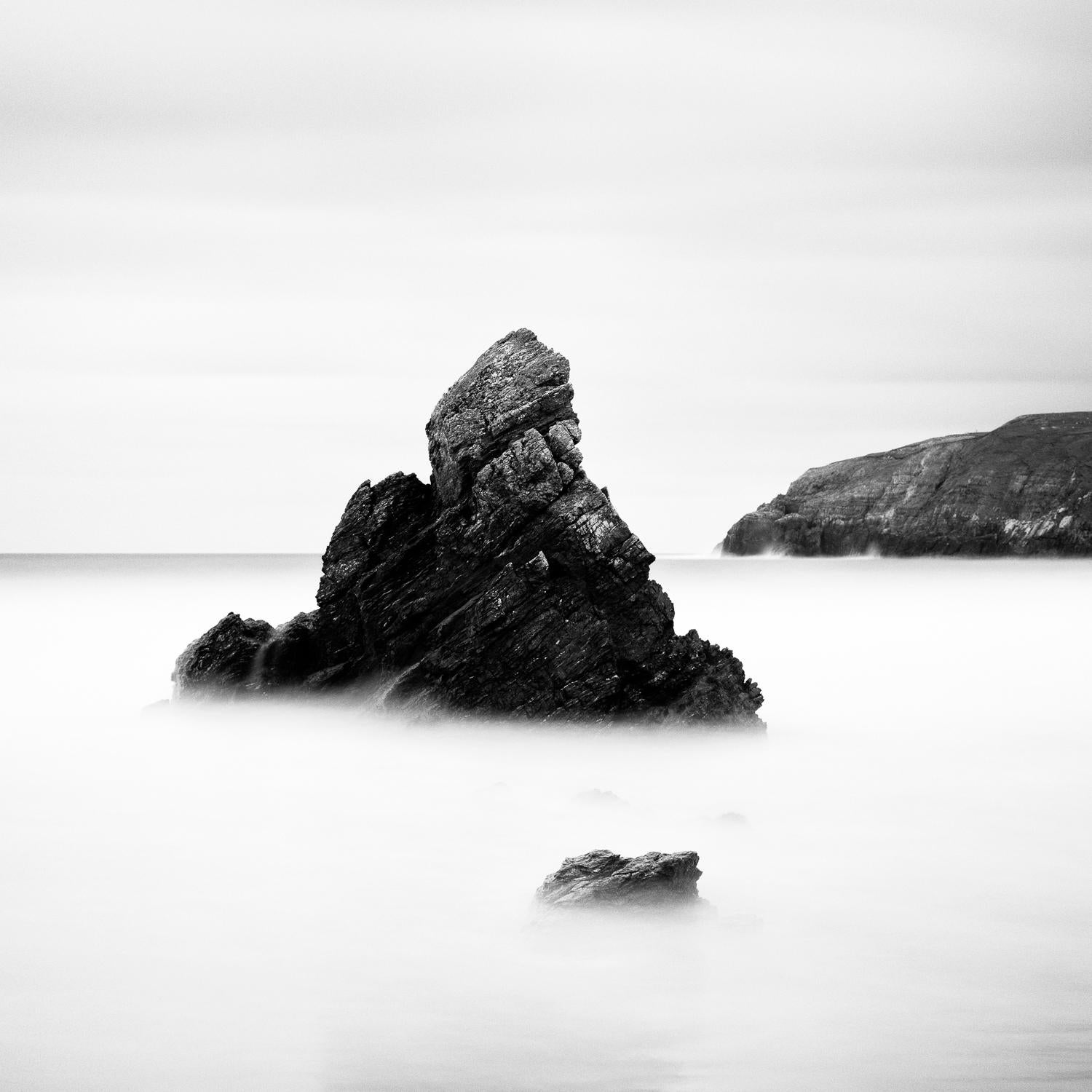Sea Stack, Scottish rocky coast, black and white analog photography, wood frame - Contemporary Photograph by Gerald Berghammer