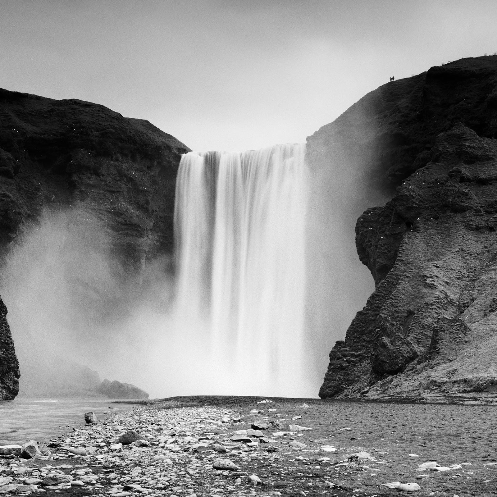 Black and white fine art long exposure landscape - waterscape photography. Skogafoss, gigantic waterfall, Iceland. Archival pigment ink print, edition of 9. Signed, titled, dated and numbered by artist. Certificate of authenticity included. Printed