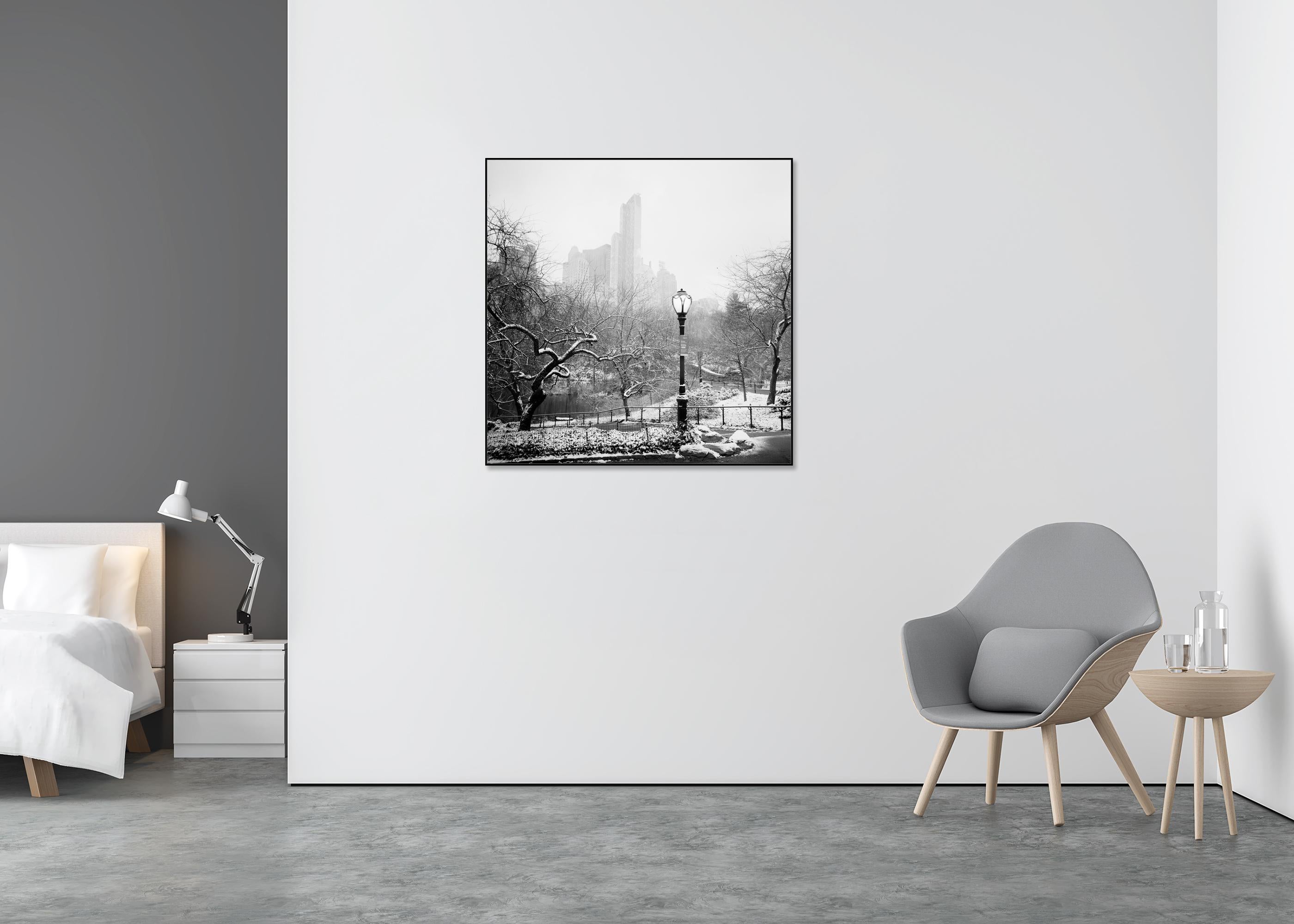 Snow covered Central Park New York City monocome cityscape - Contemporary Photograph by Gerald Berghammer