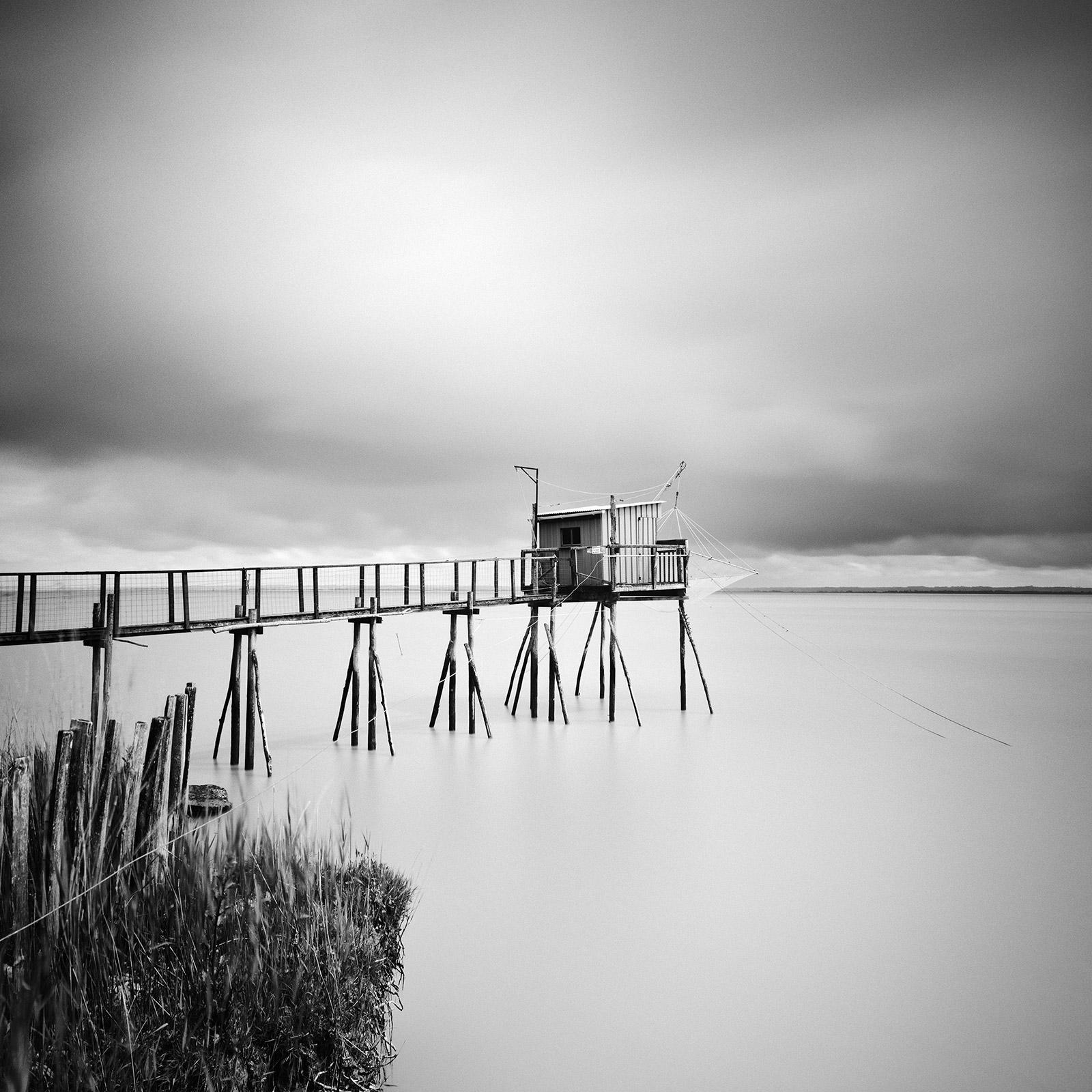 Gerald Berghammer Landscape Photograph - Stilt House, carrelet, fishing, France, black and white photography, landscape