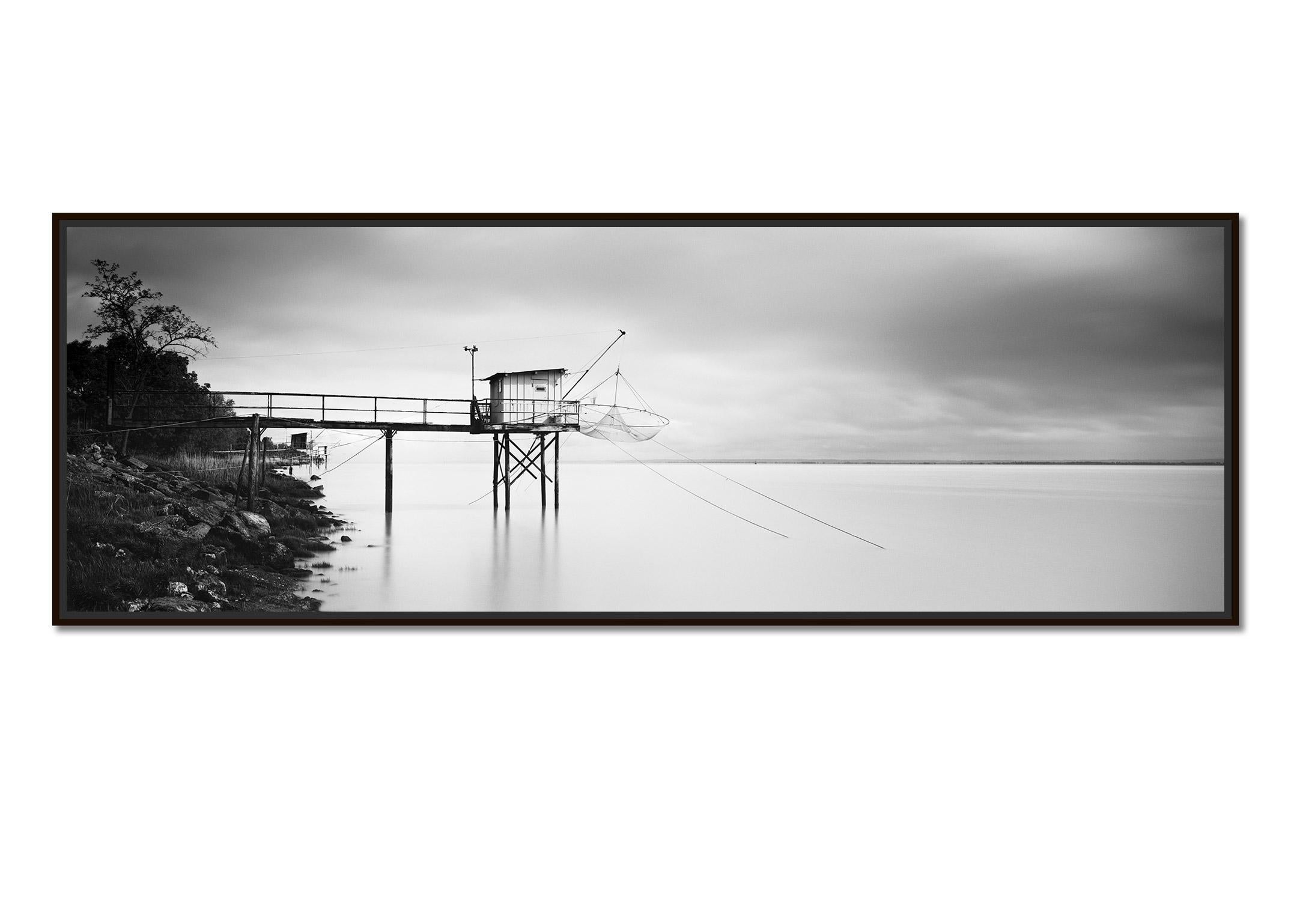 Stilt House Panorama, Fishing, Storm, black white fineart landscape photography - Photograph by Gerald Berghammer