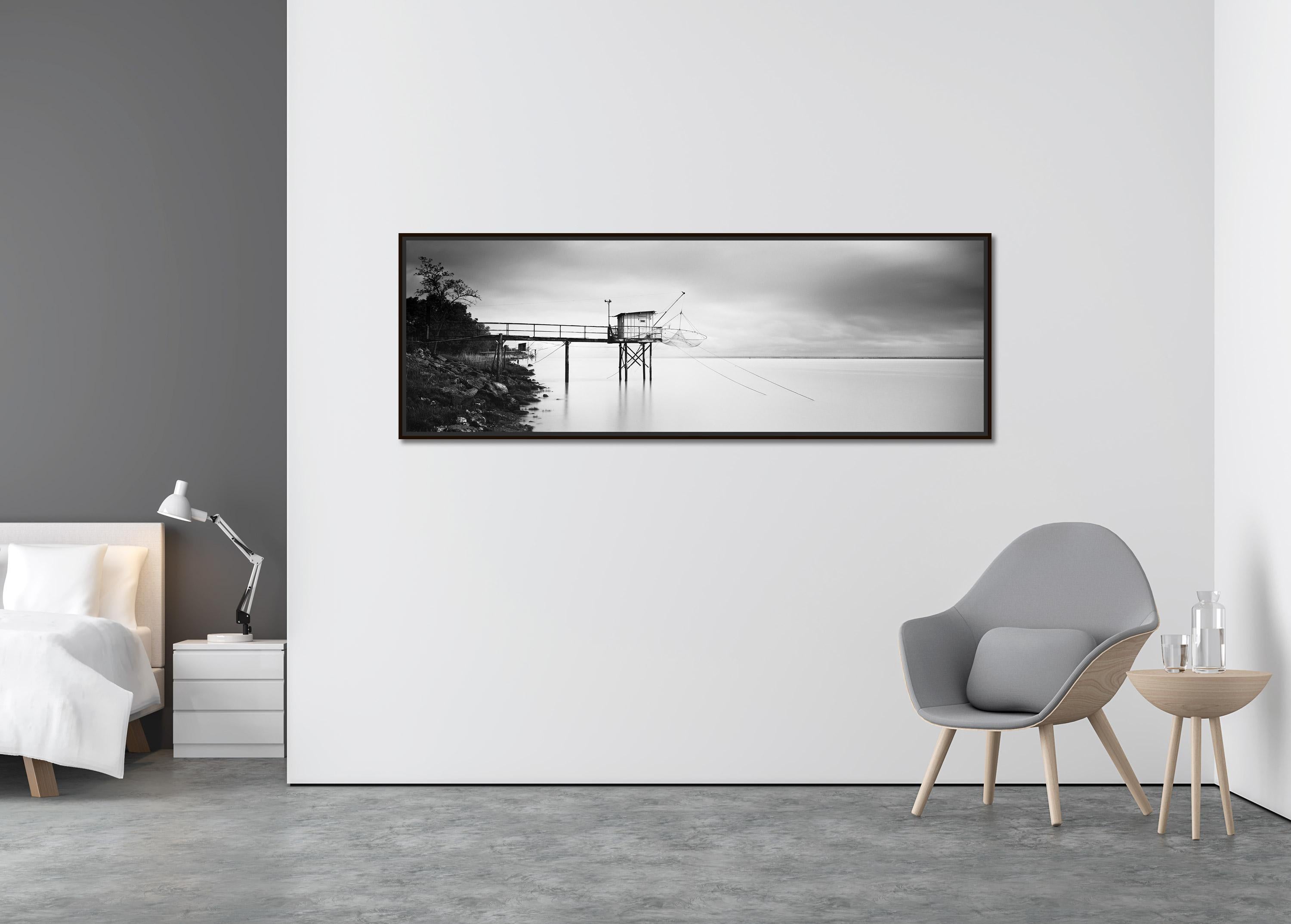 Stilt House Panorama, Fishing, Storm, black white fineart landscape photography - Contemporary Photograph by Gerald Berghammer